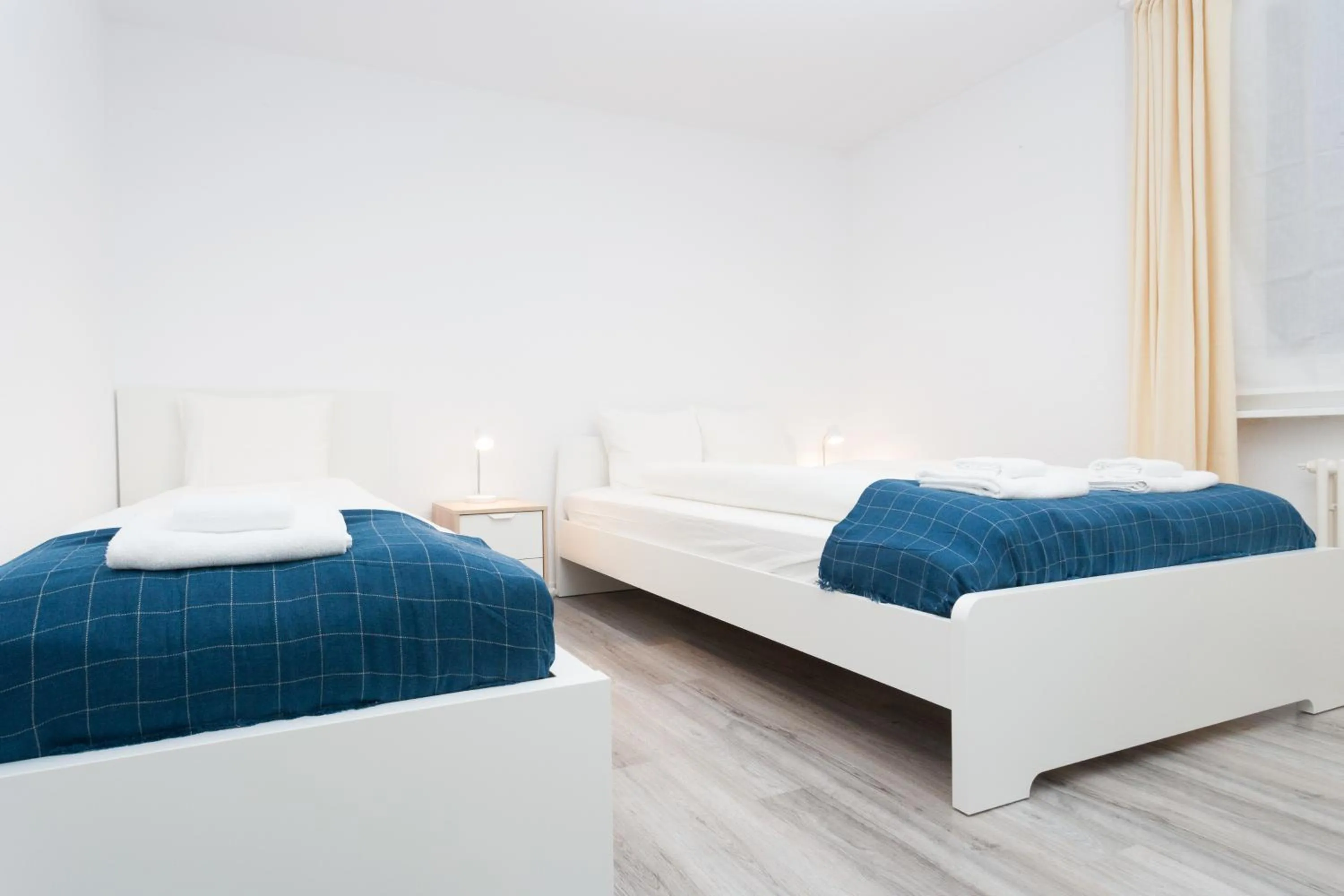 Bed in Galaxy Apartments Lucerne