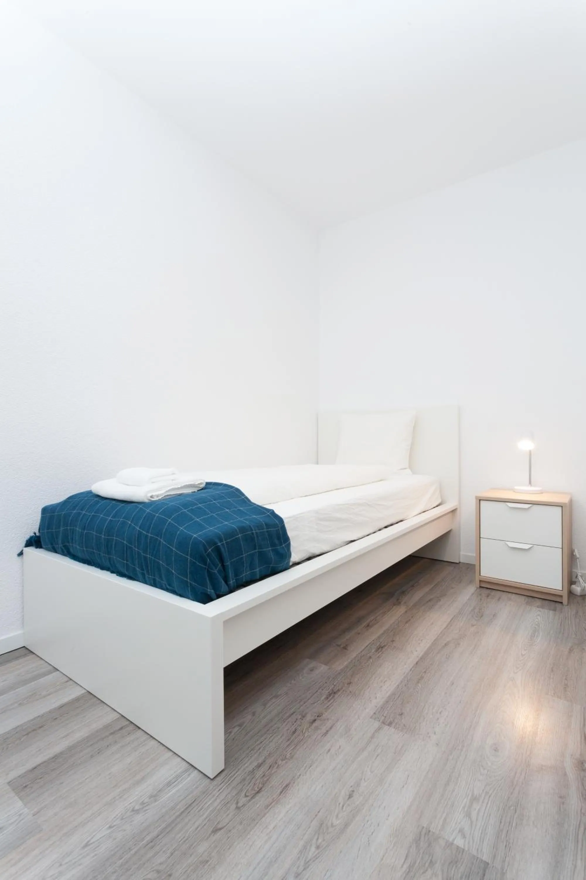 Bed in Galaxy Apartments Lucerne