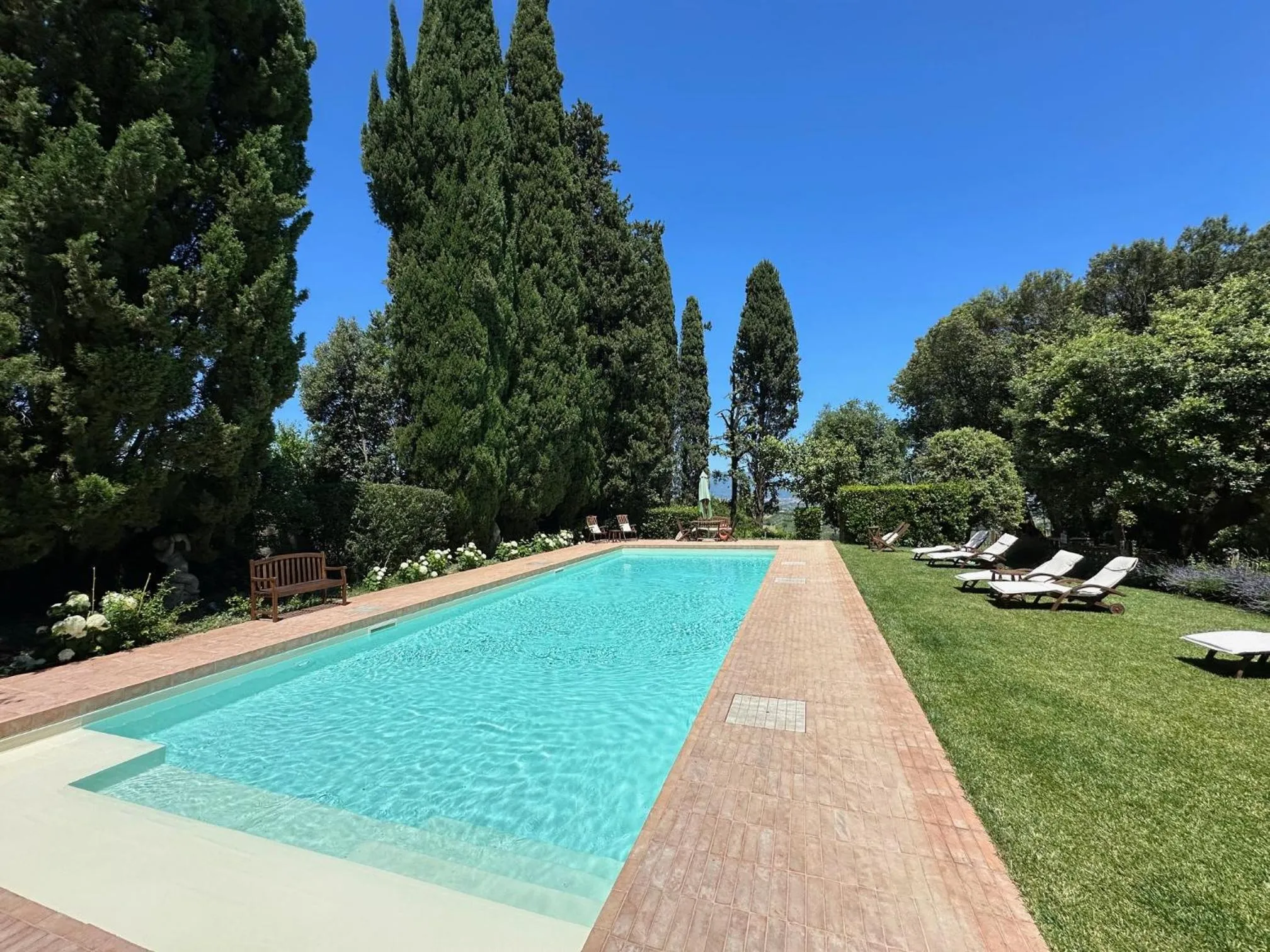 Pool view in Agriturismo La Fattoria di Capezzana