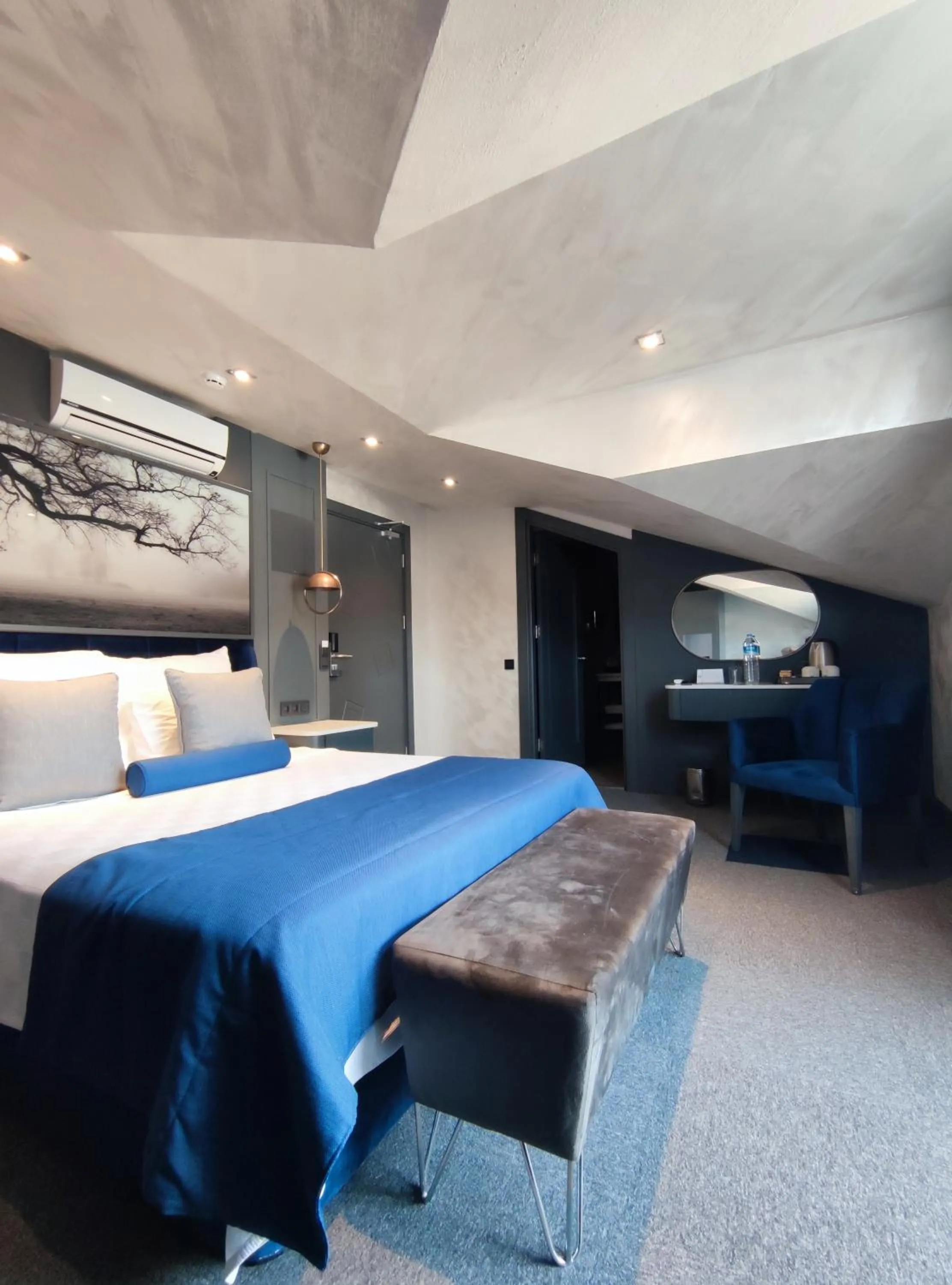 Bed in Skopea Inn Exclusive Hotel