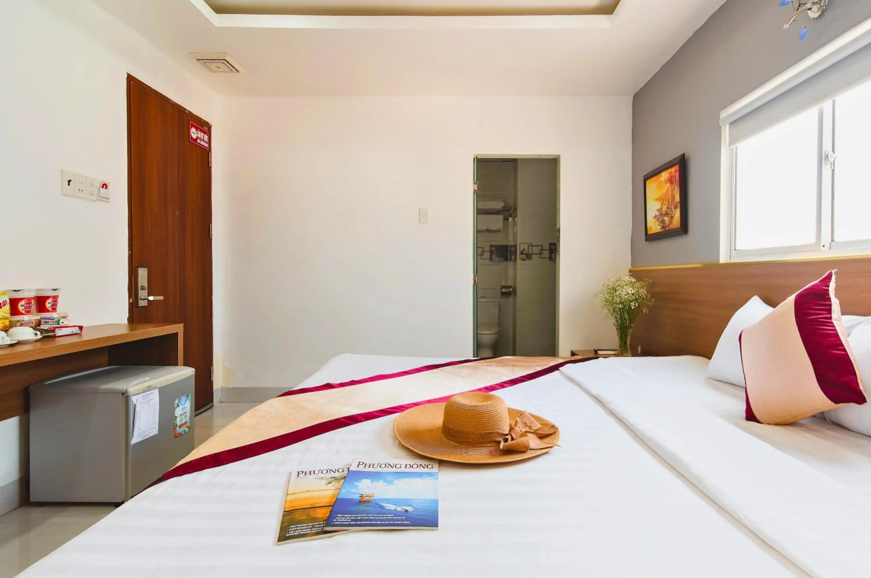 Bed in Arise Seaside Hotel