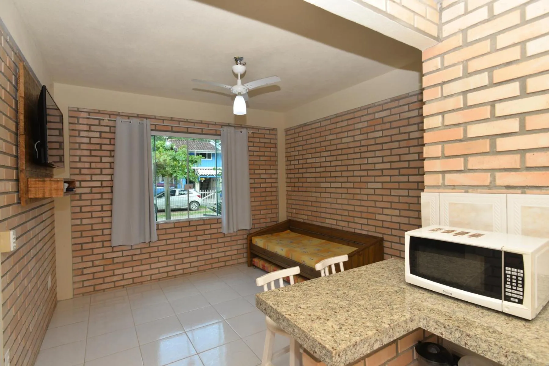 TV and multimedia in Pousada Sítio Olho D'Água