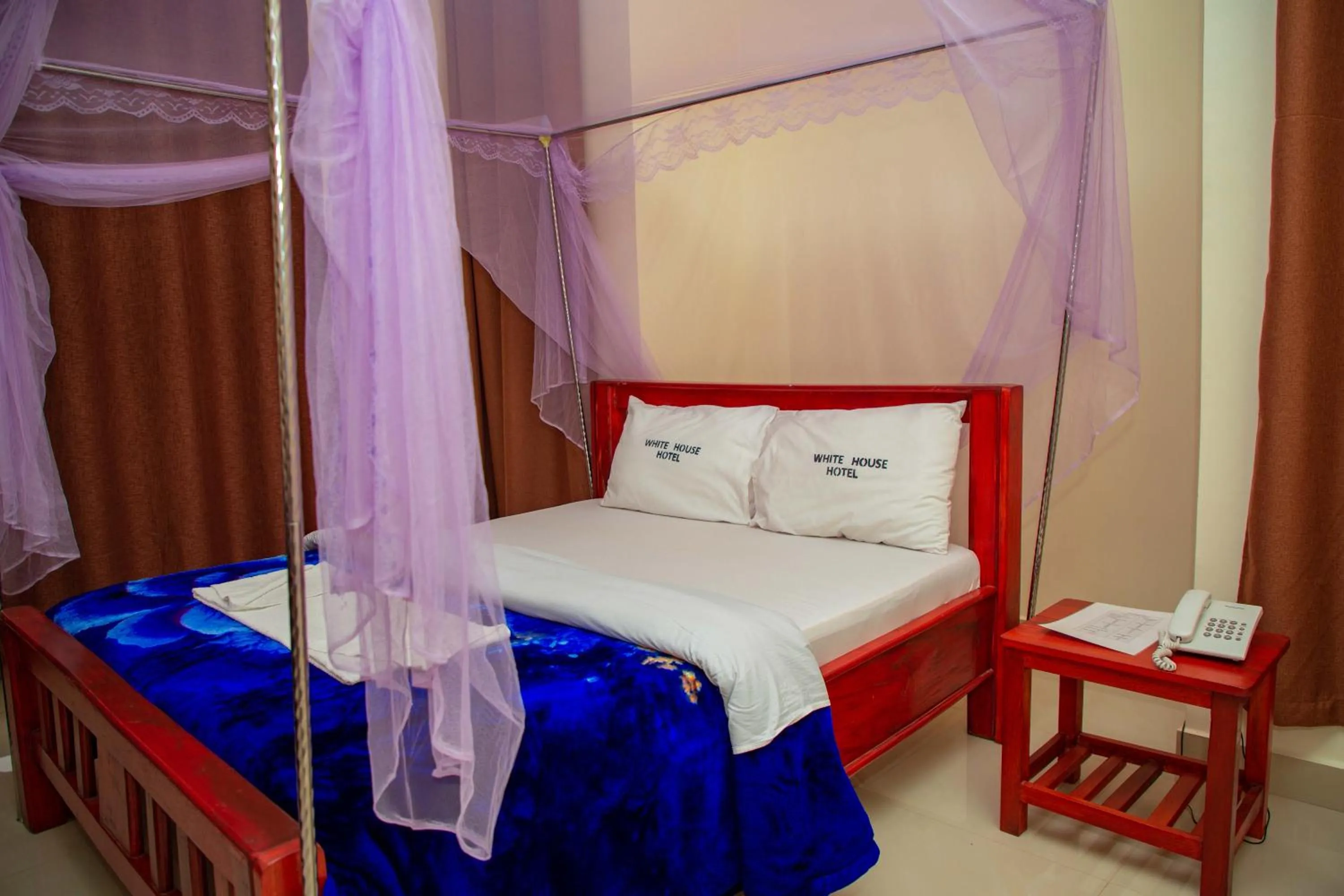 Bed in Kilimanjaro White House Hotel