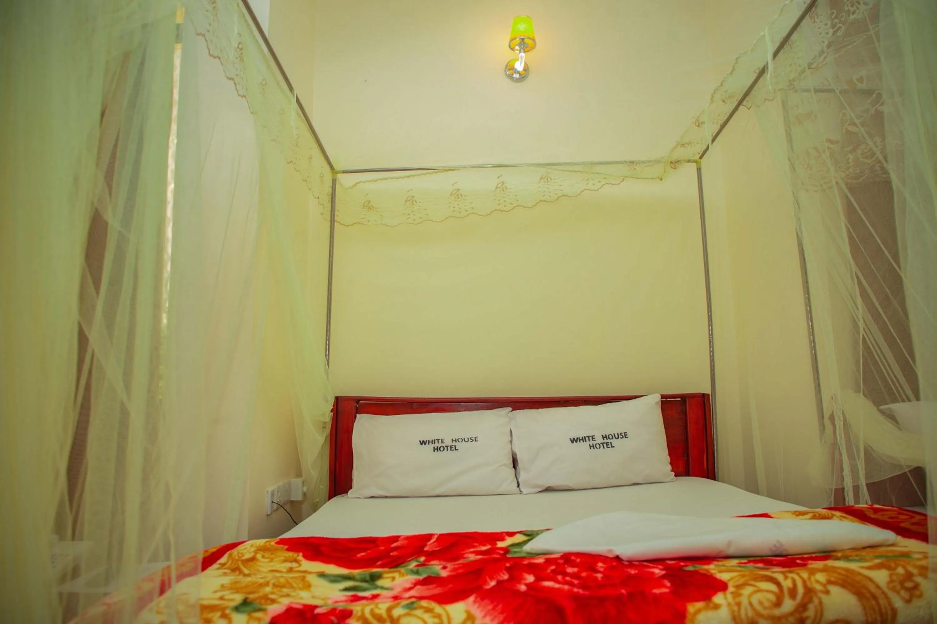 Bed in Kilimanjaro White House Hotel