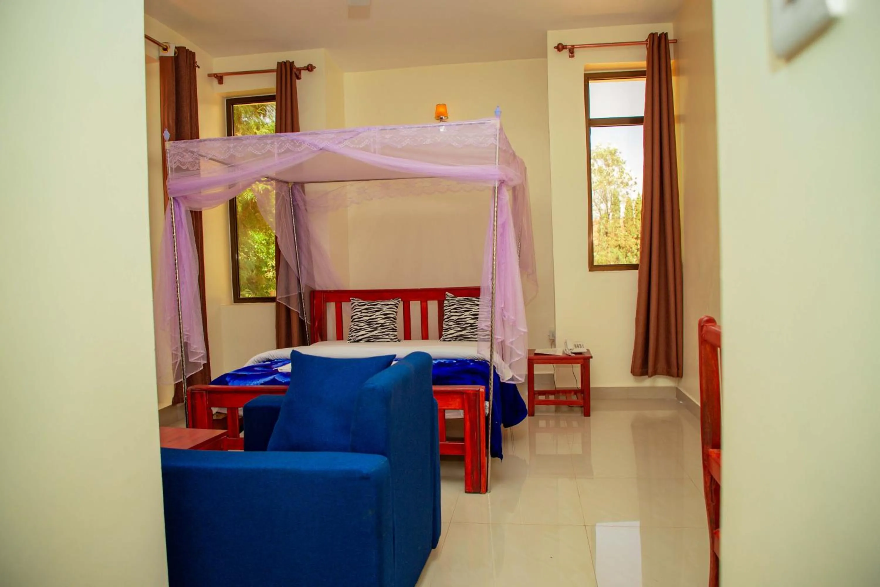 Bed in Kilimanjaro White House Hotel