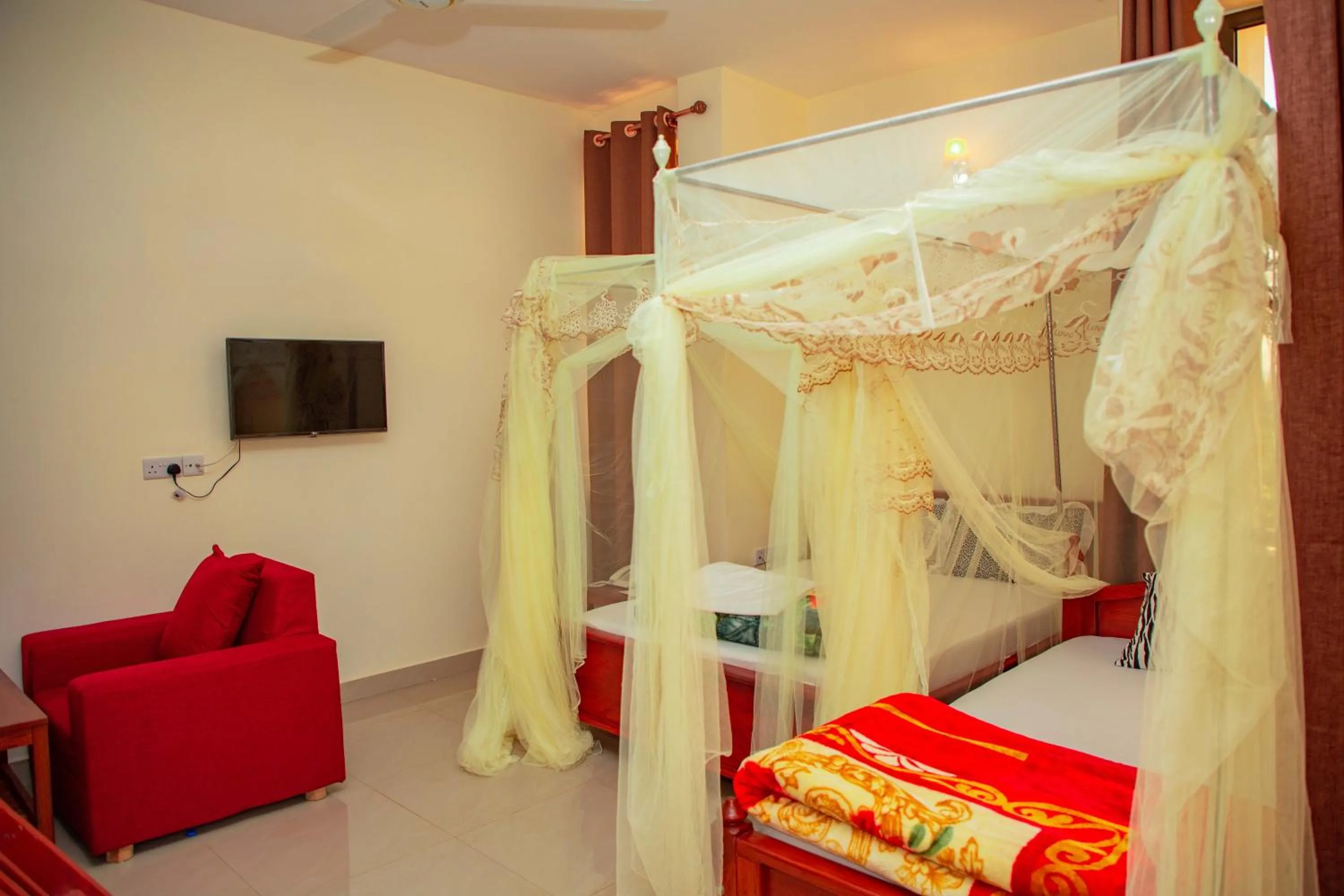 Bed in Kilimanjaro White House Hotel