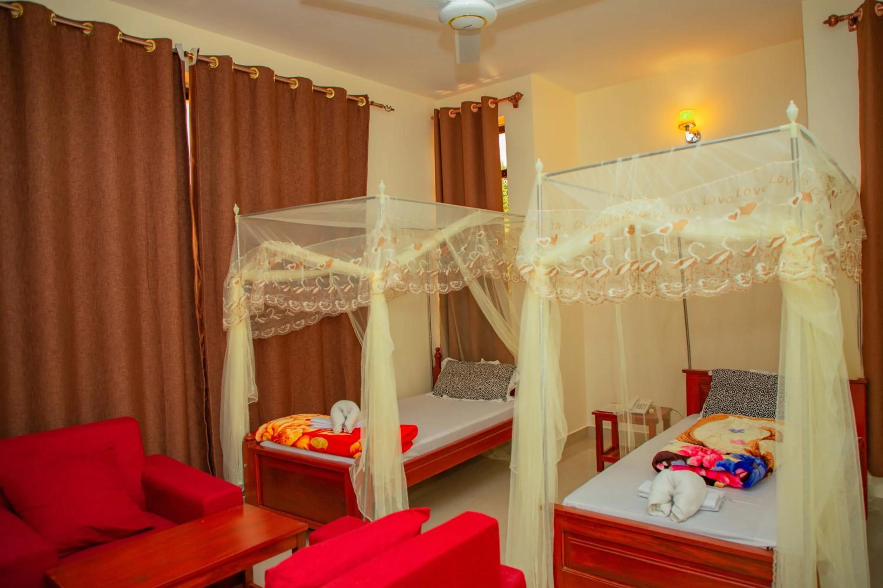 Bed in Kilimanjaro White House Hotel