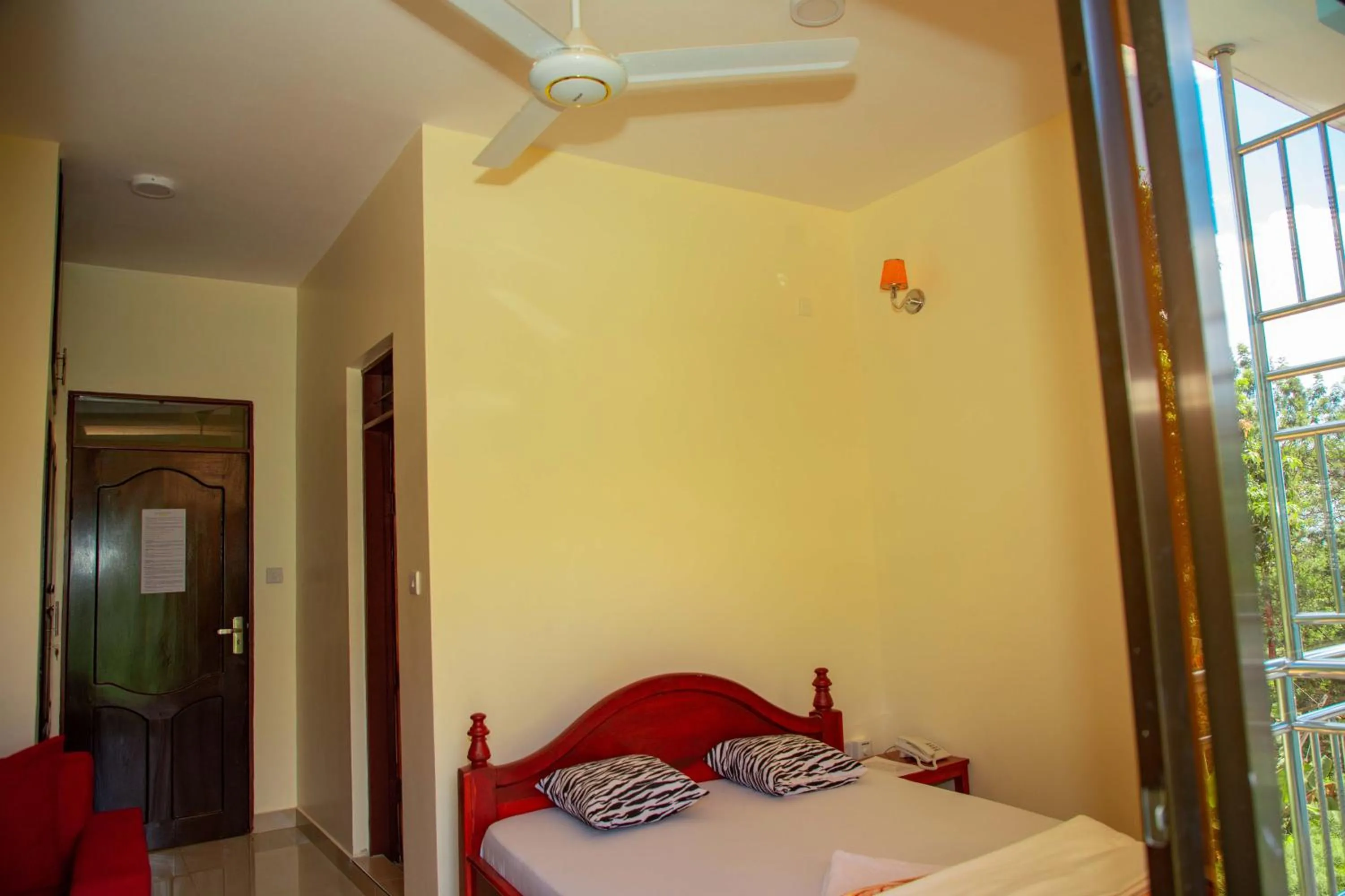 Bed in Kilimanjaro White House Hotel