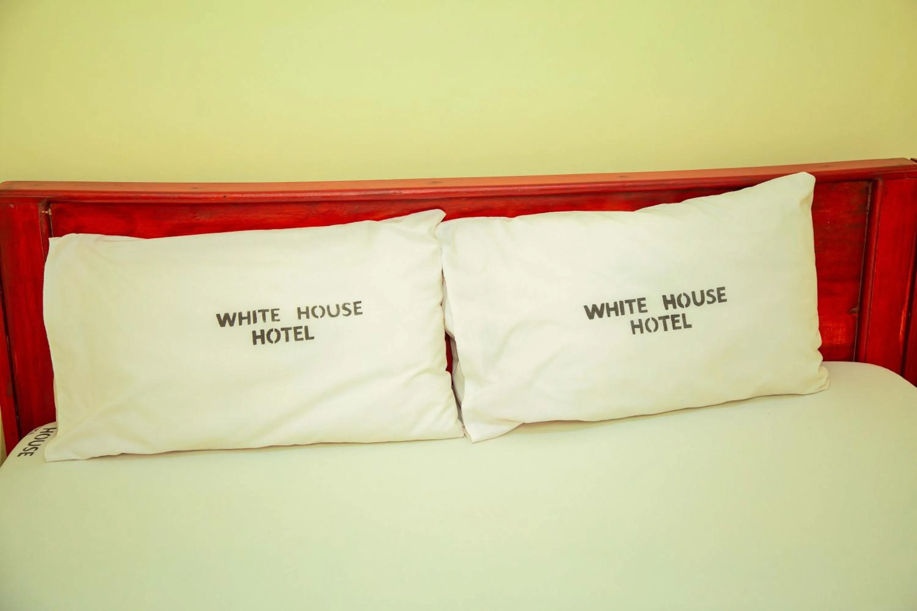 Bed in Kilimanjaro White House Hotel