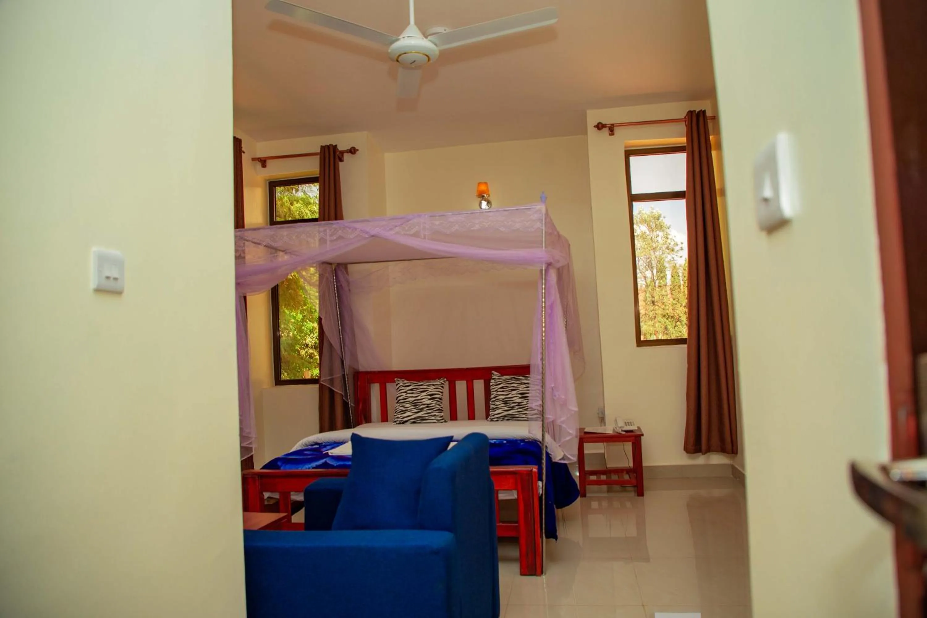 Bed in Kilimanjaro White House Hotel