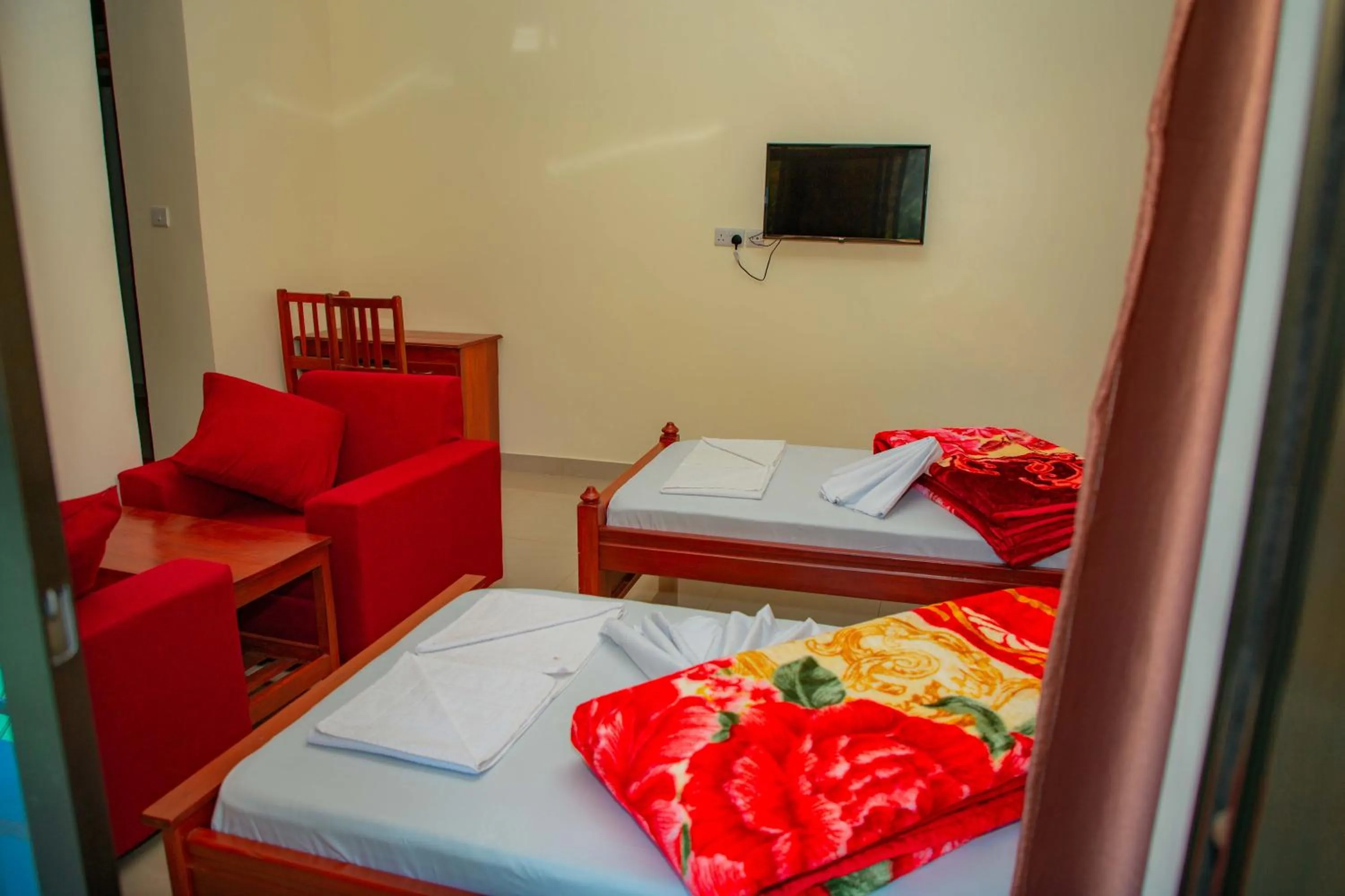 Bed in Kilimanjaro White House Hotel