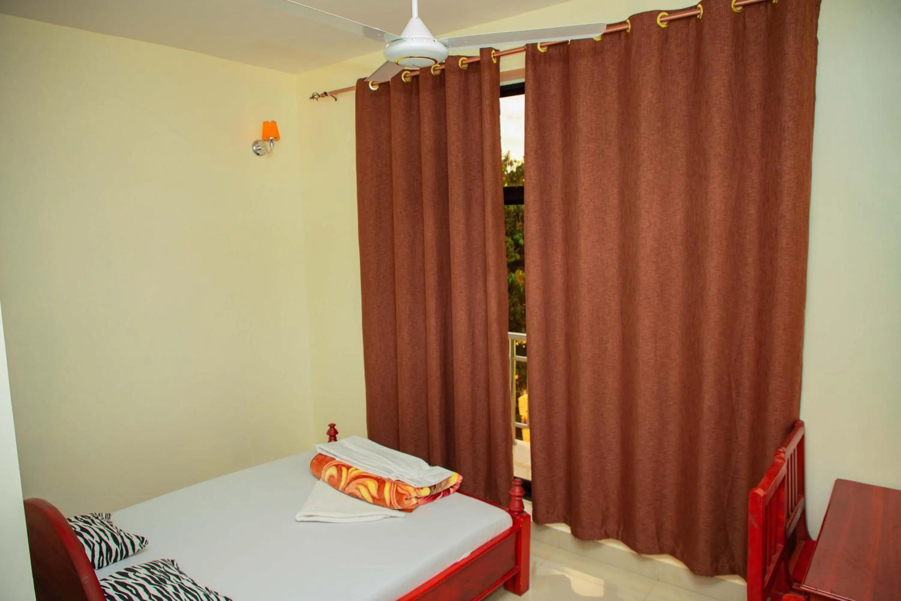 Bed in Kilimanjaro White House Hotel