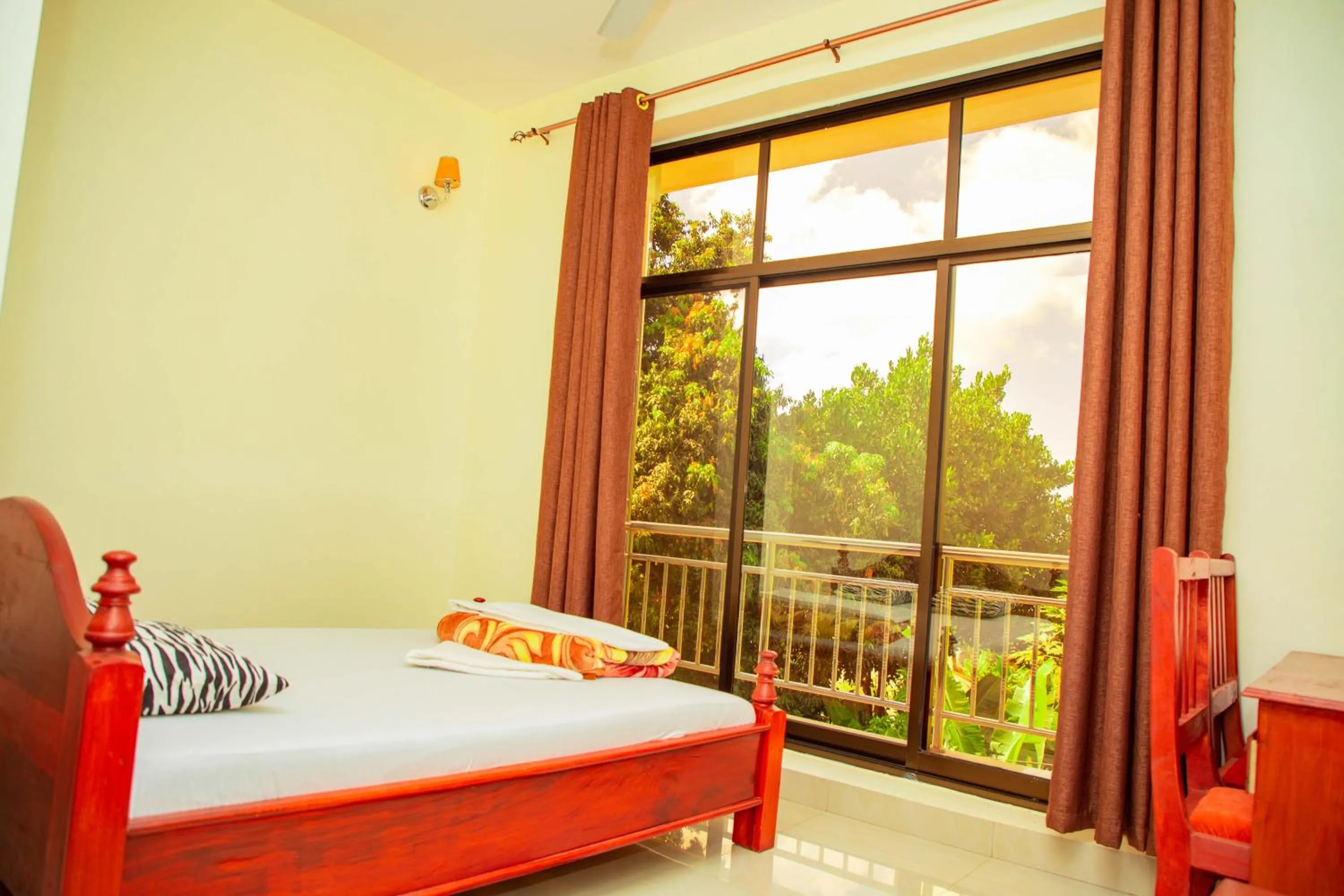 Bed in Kilimanjaro White House Hotel