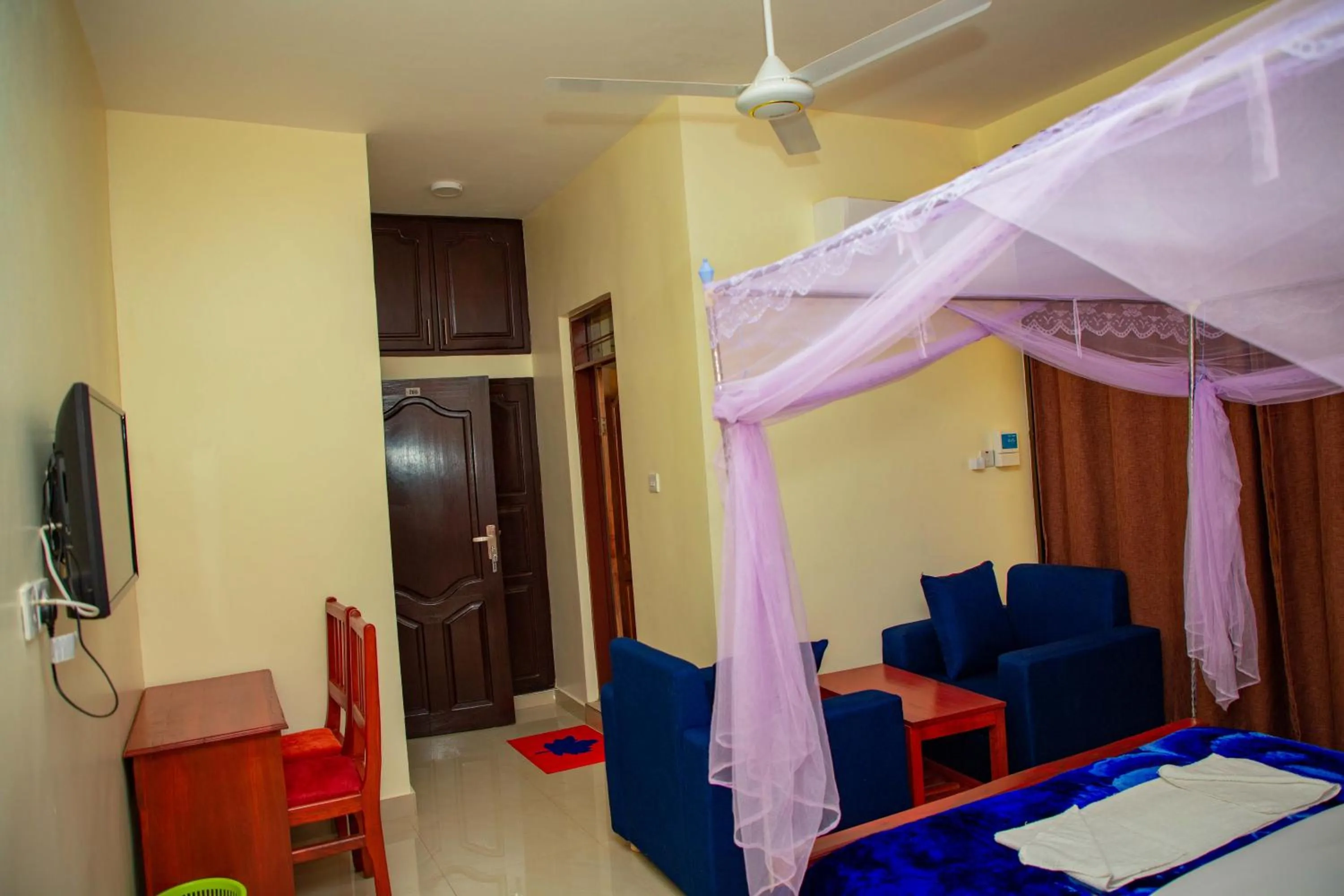 Bed in Kilimanjaro White House Hotel