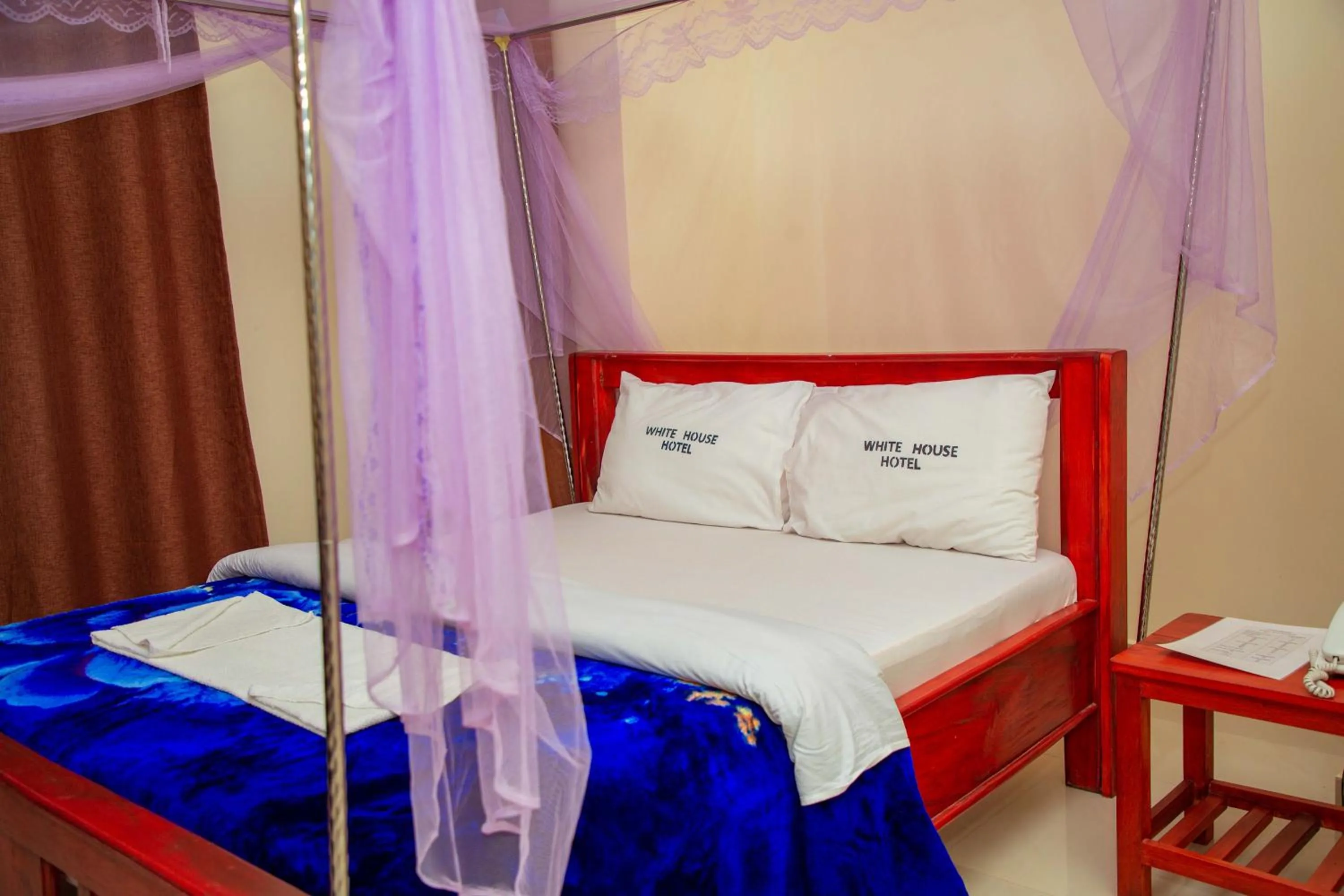 Bed in Kilimanjaro White House Hotel