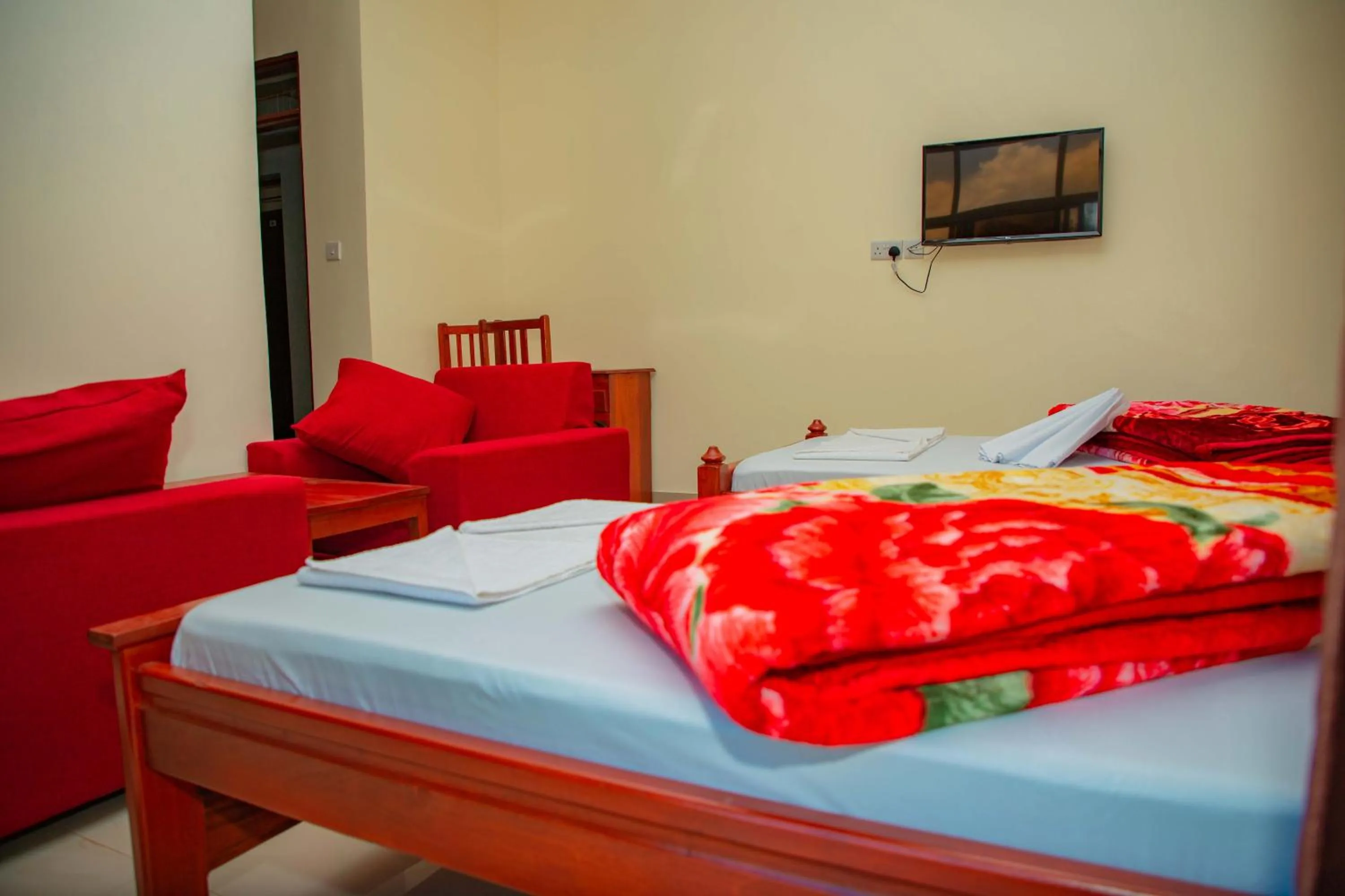 Bed in Kilimanjaro White House Hotel