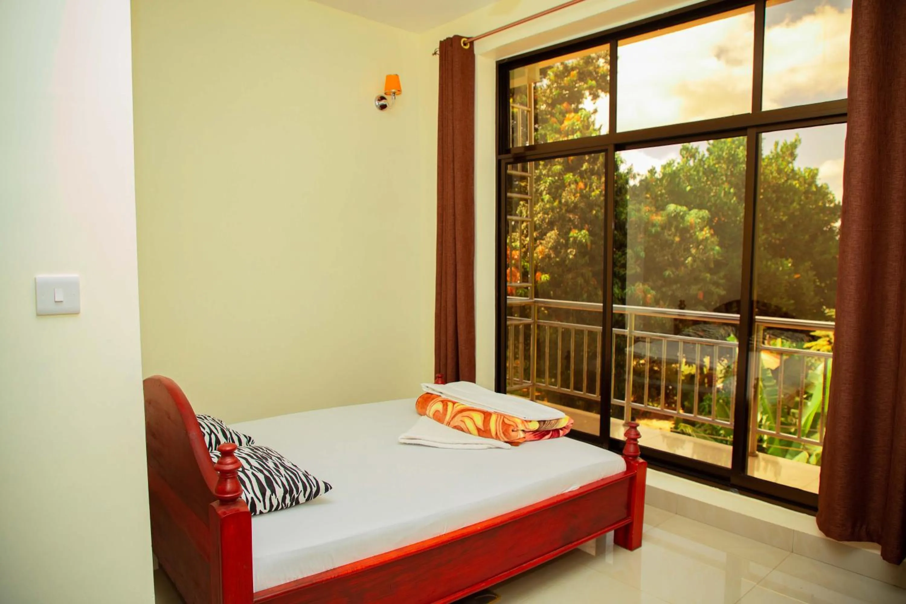 Bed in Kilimanjaro White House Hotel