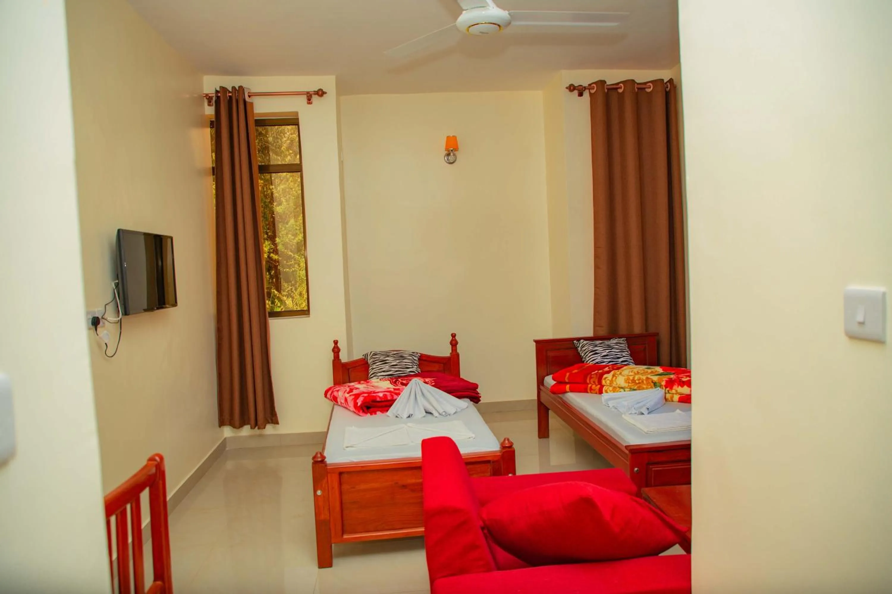 Bed in Kilimanjaro White House Hotel