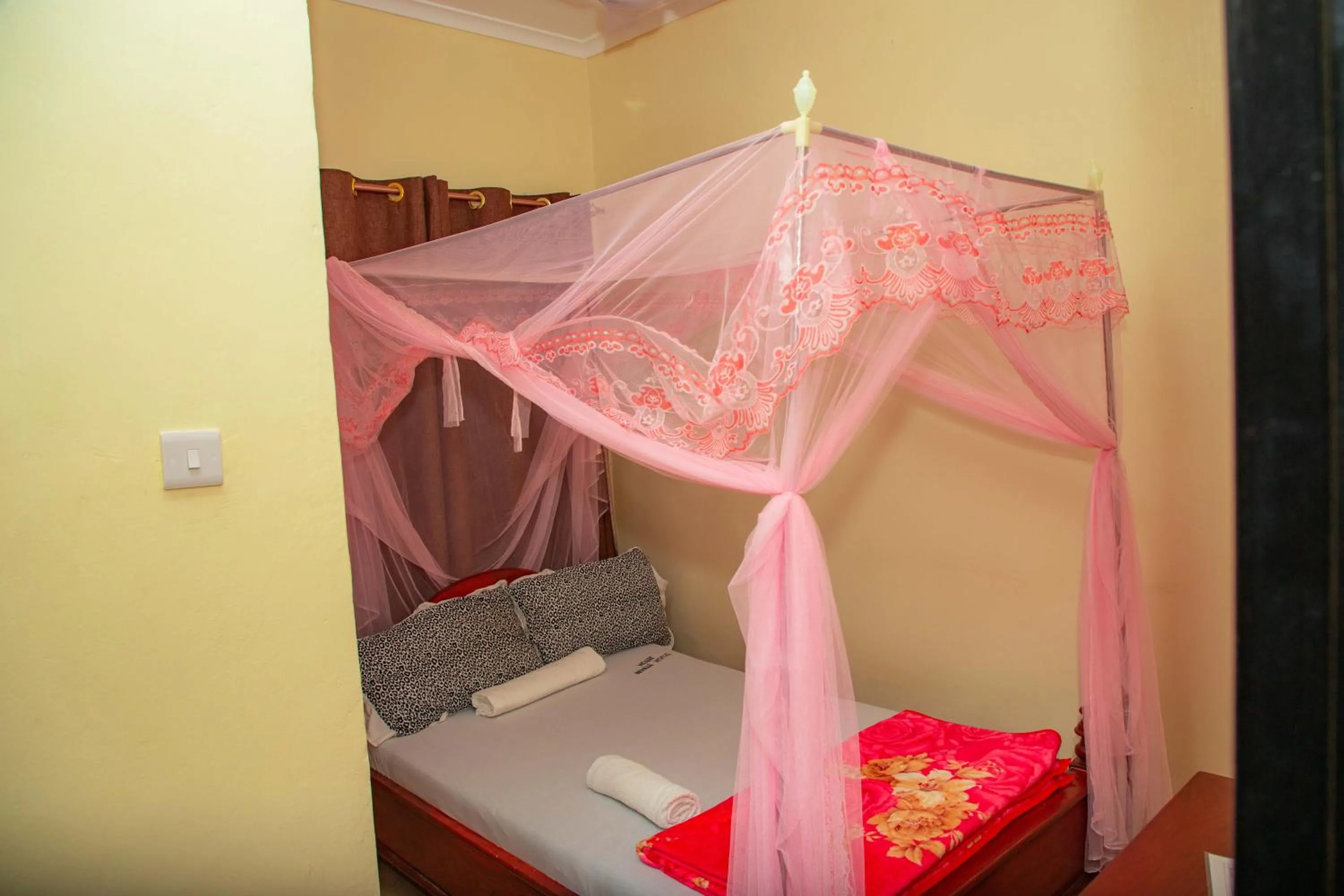 Bed in Kilimanjaro White House Hotel