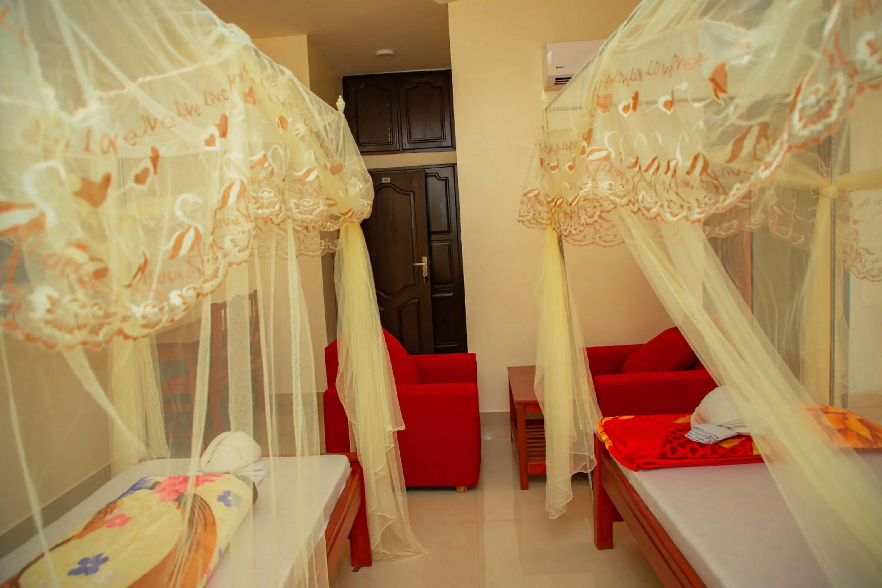 Bed in Kilimanjaro White House Hotel