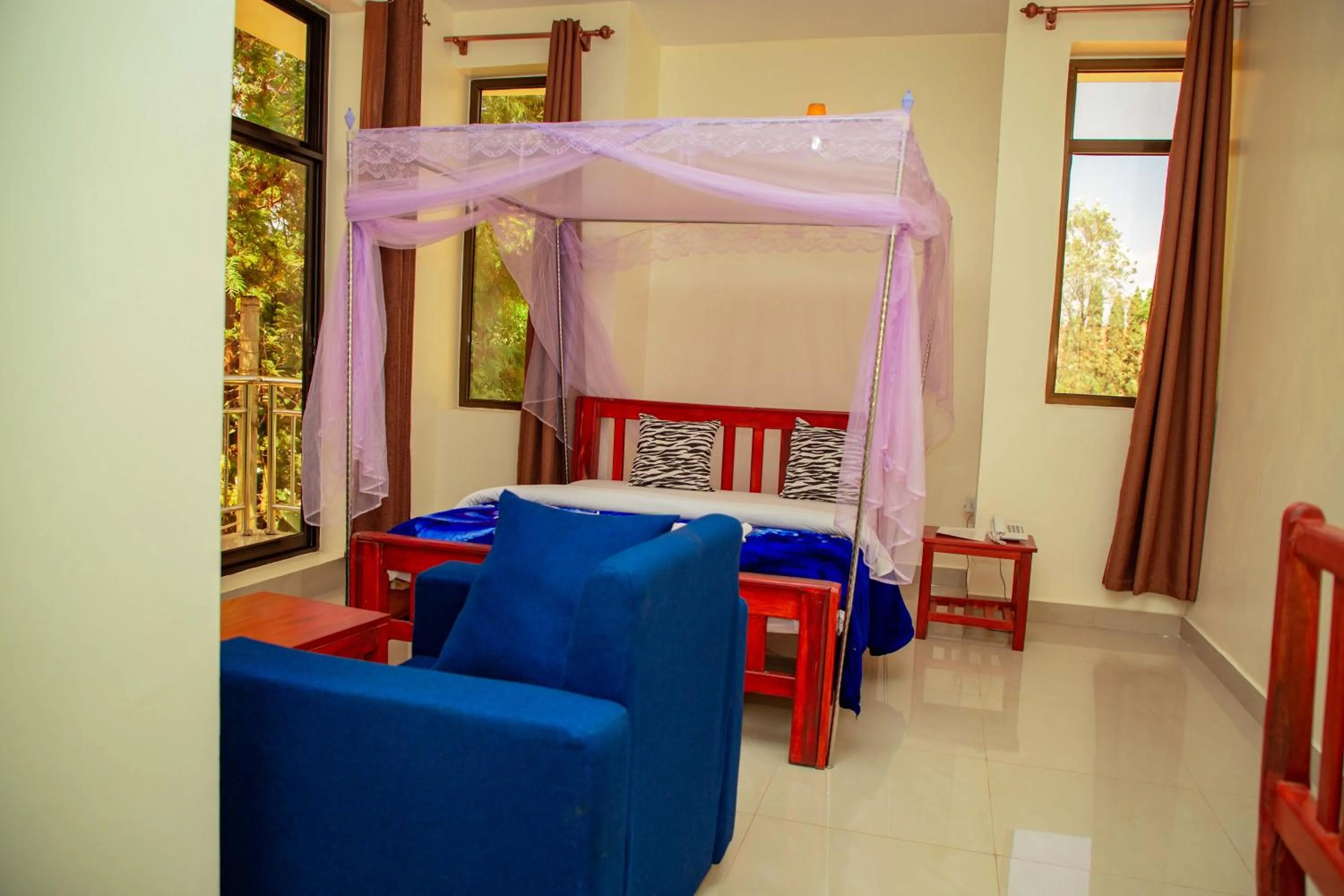 Bed in Kilimanjaro White House Hotel