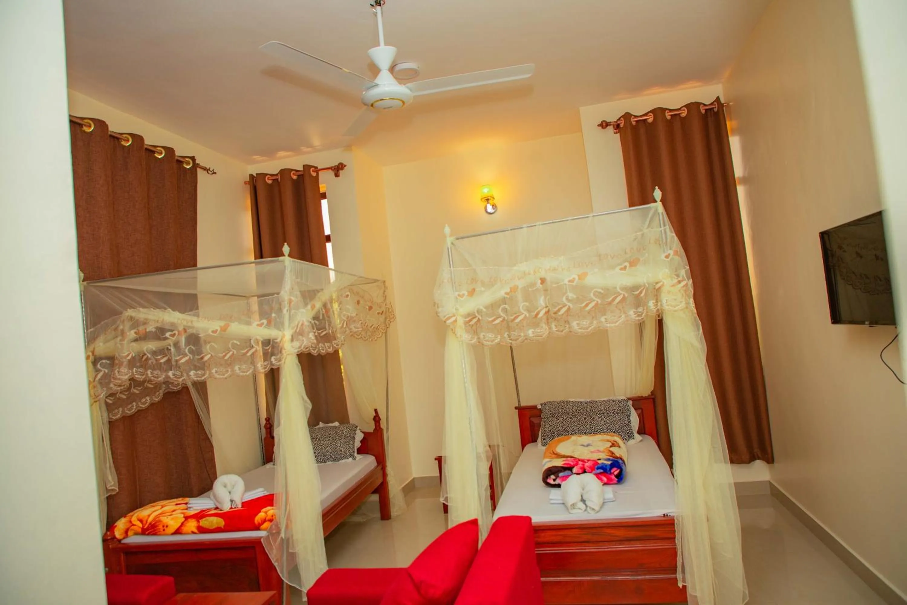 Bed in Kilimanjaro White House Hotel