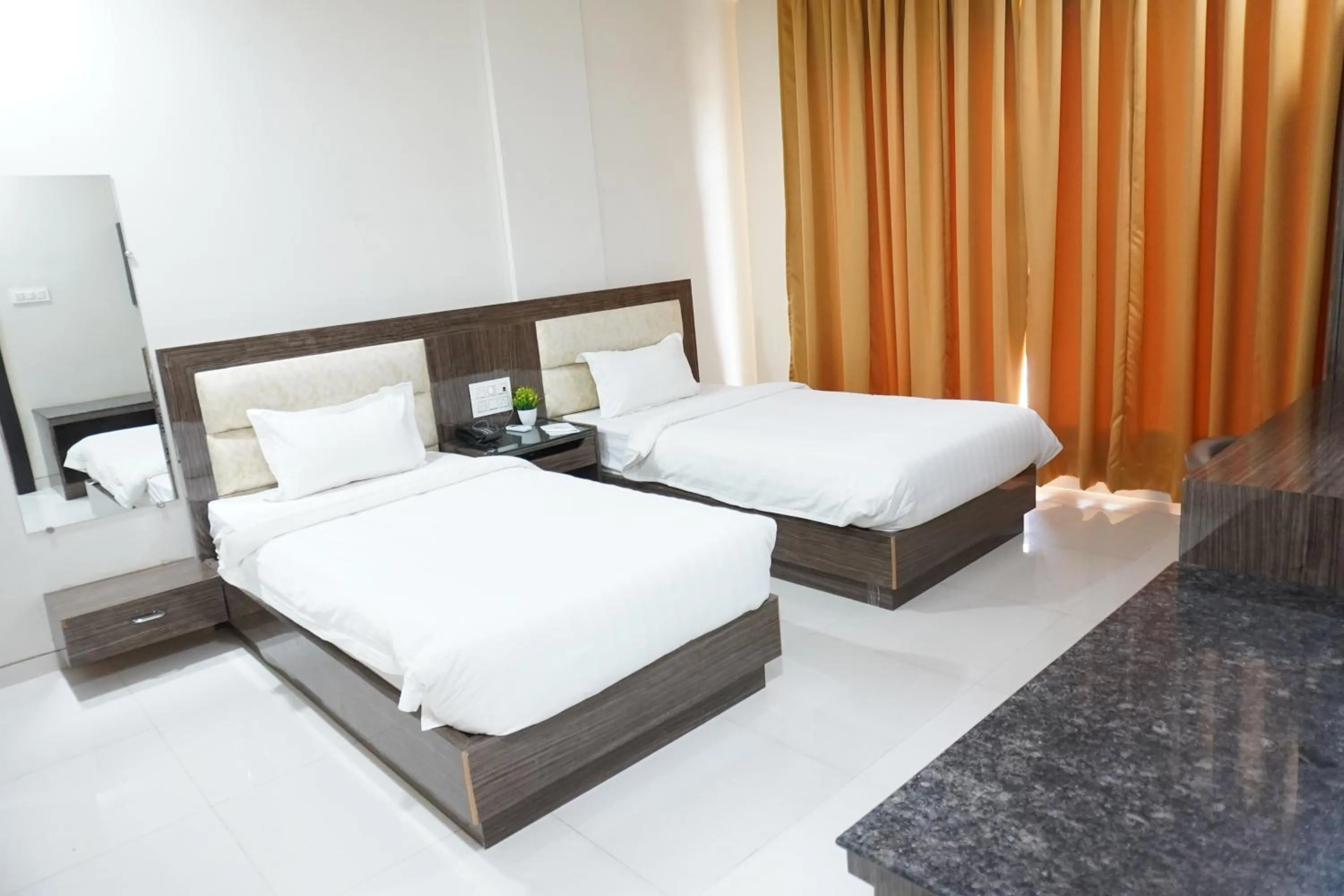 Bed in The Aanandam Hotel Resort