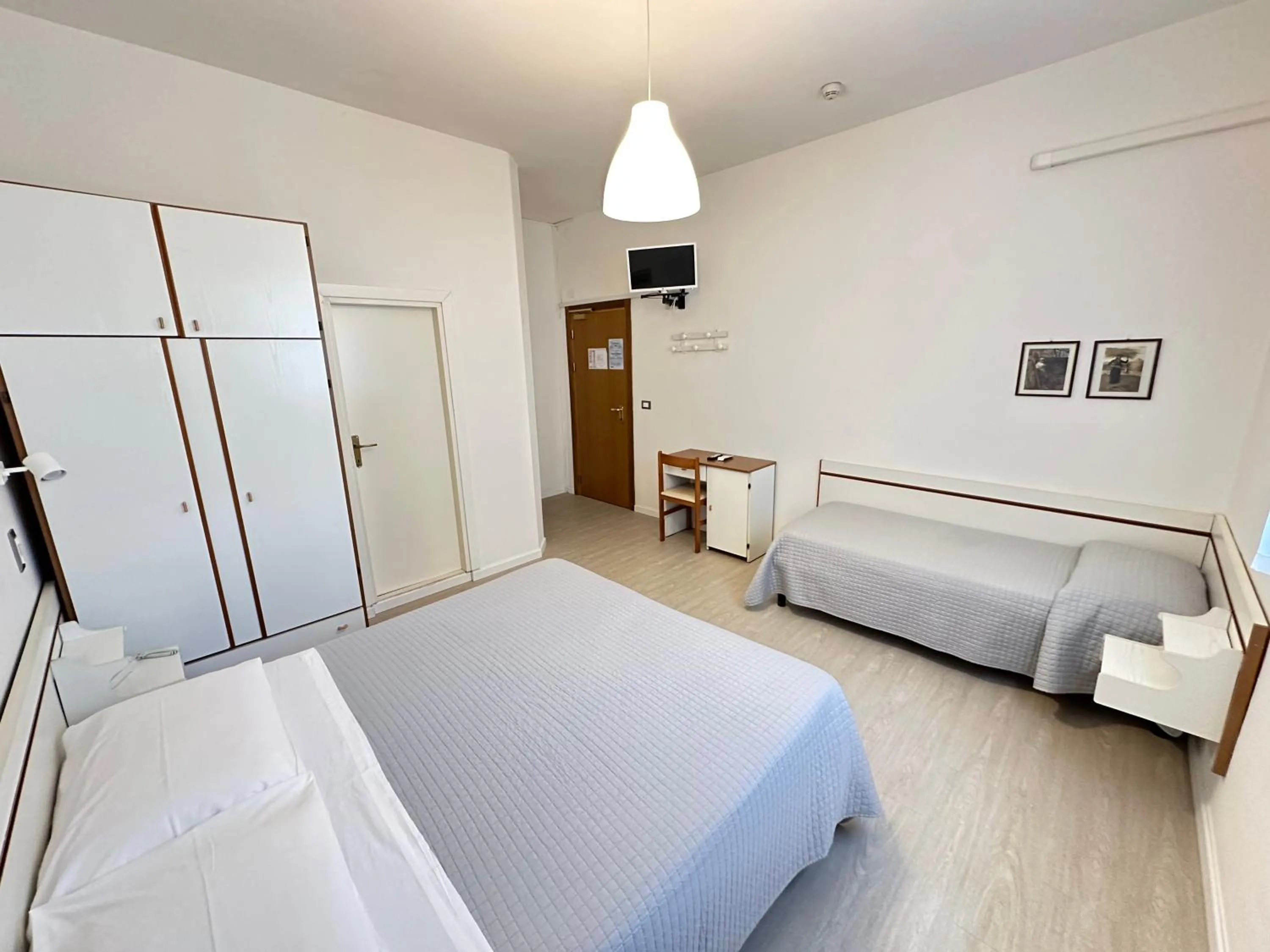 Bed in Hotel Fiorenza