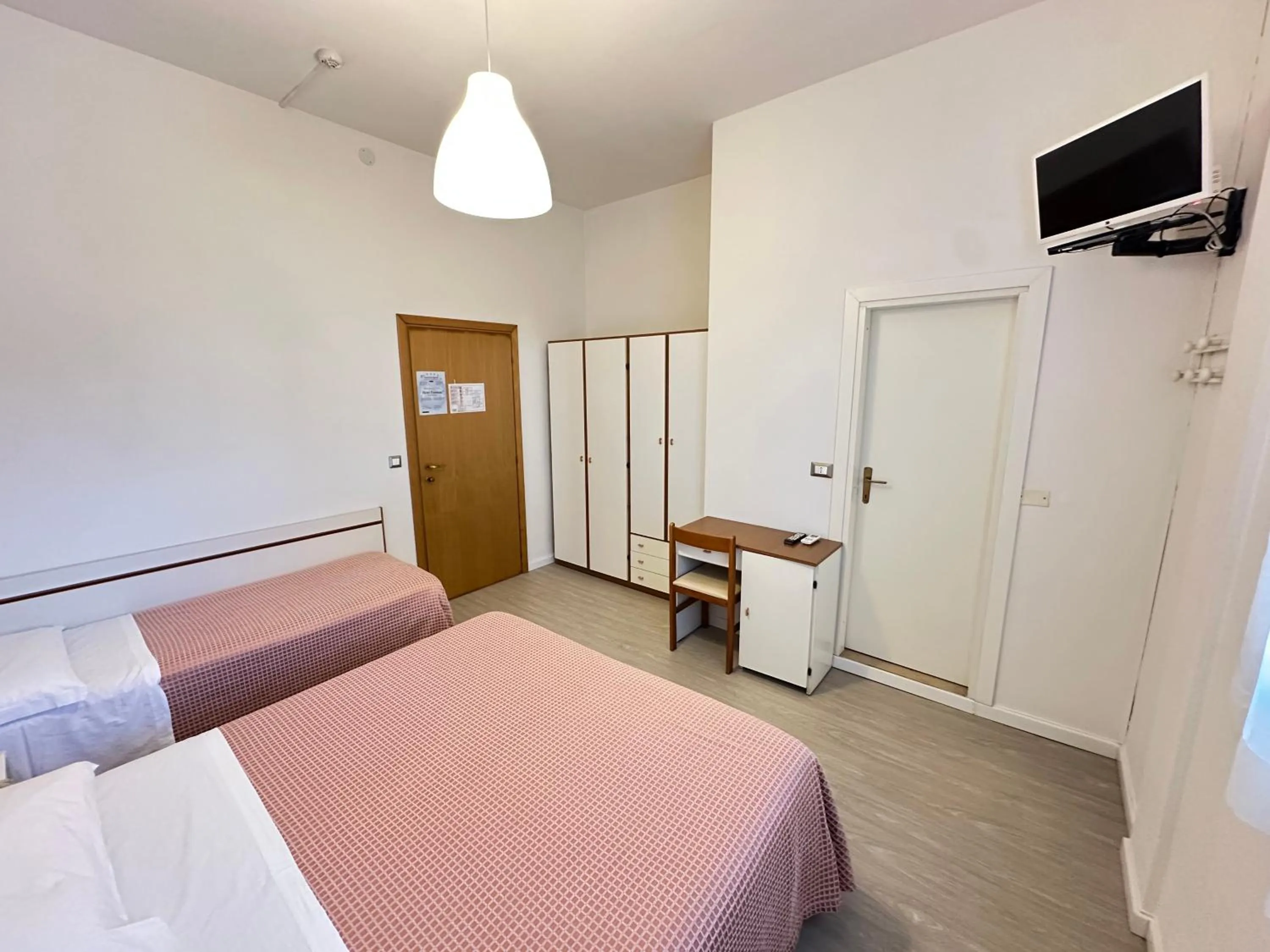 Bed in Hotel Fiorenza