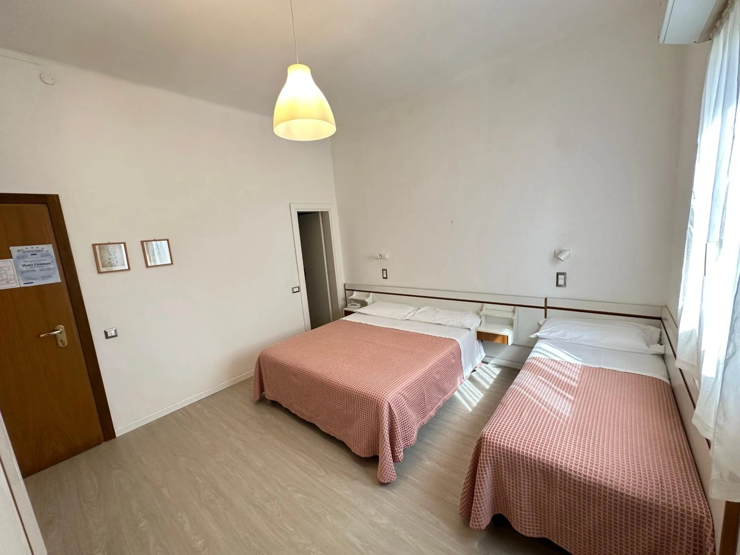 Bed in Hotel Fiorenza