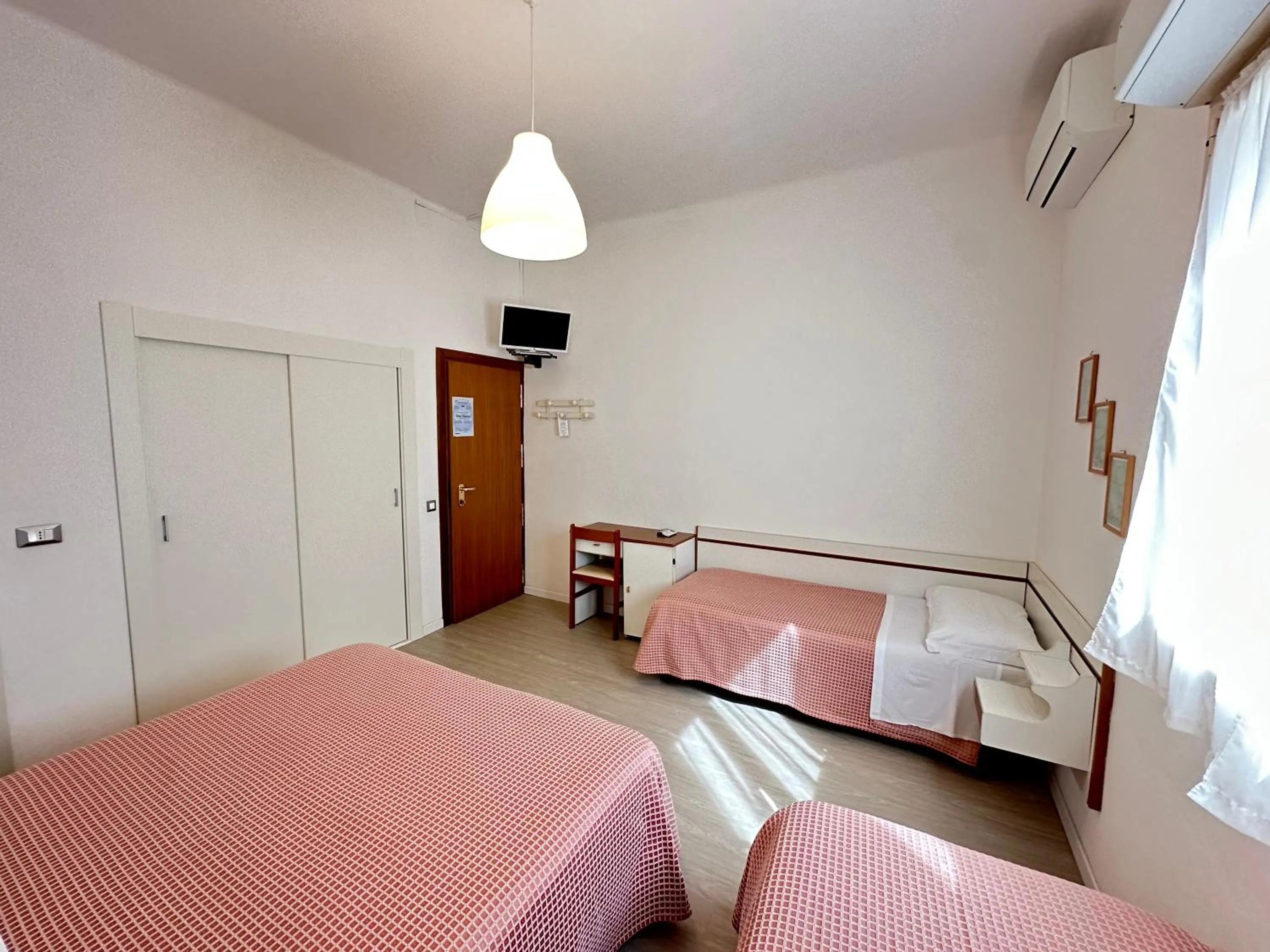 Bed in Hotel Fiorenza