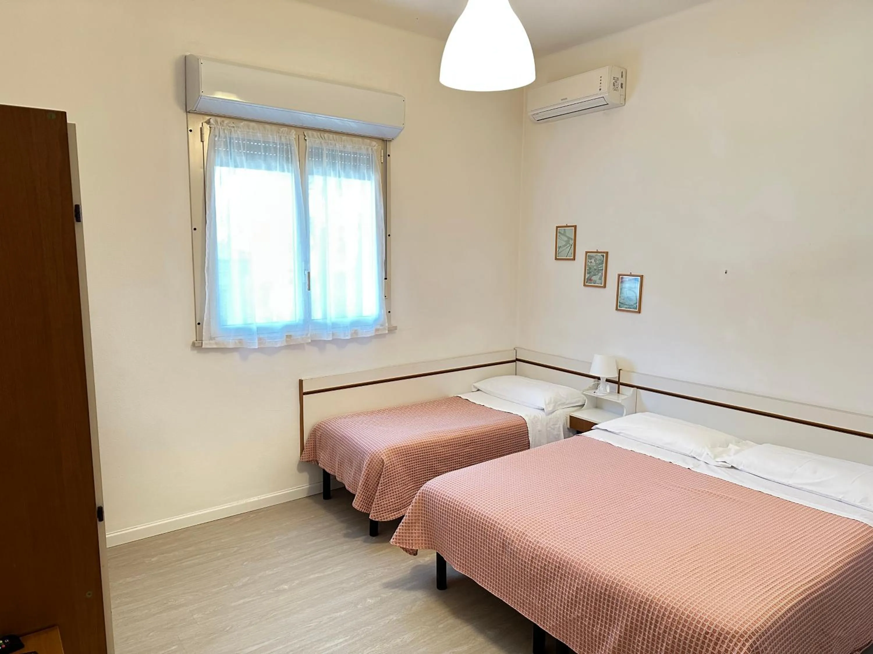 Bed in Hotel Fiorenza