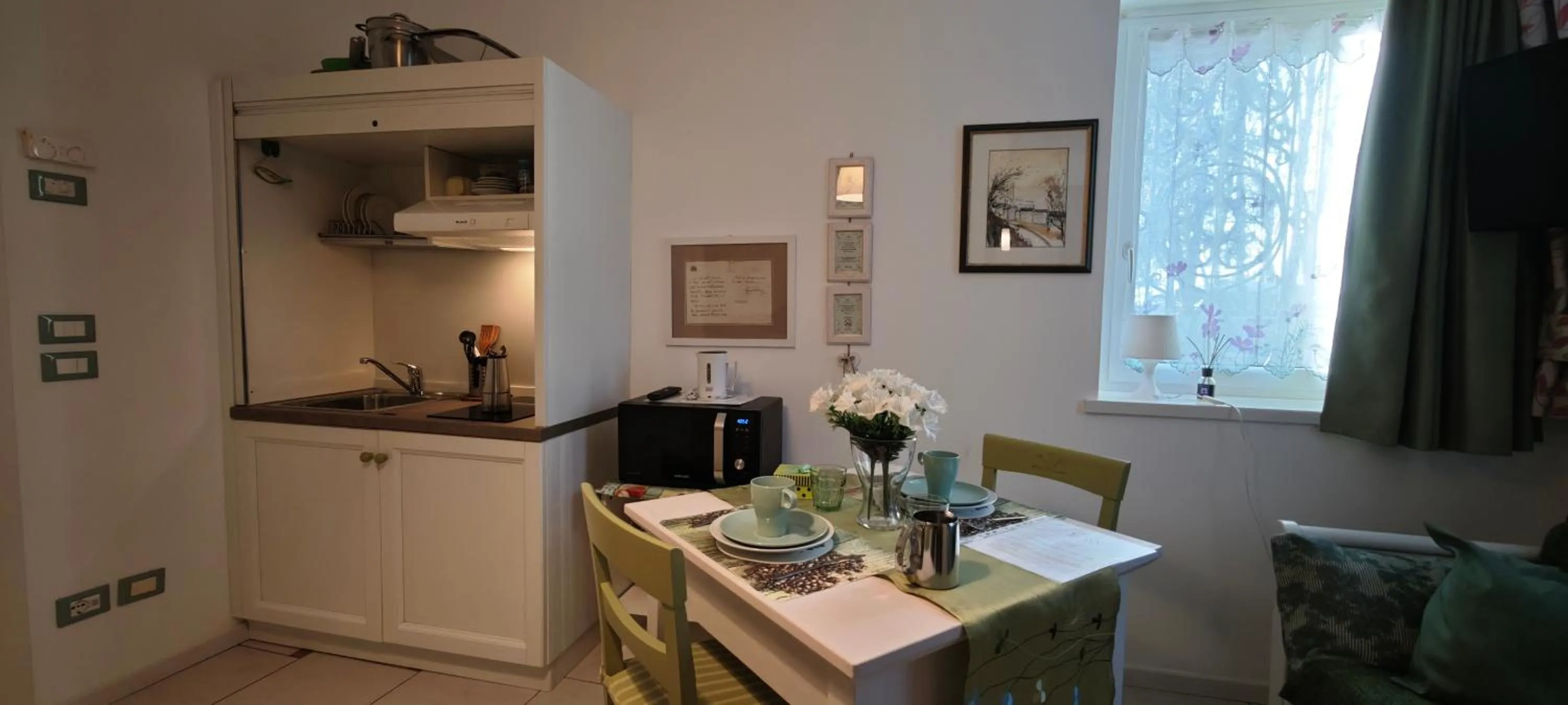 Kitchen or kitchenette in Casa Novecento "Rooms & apartments"