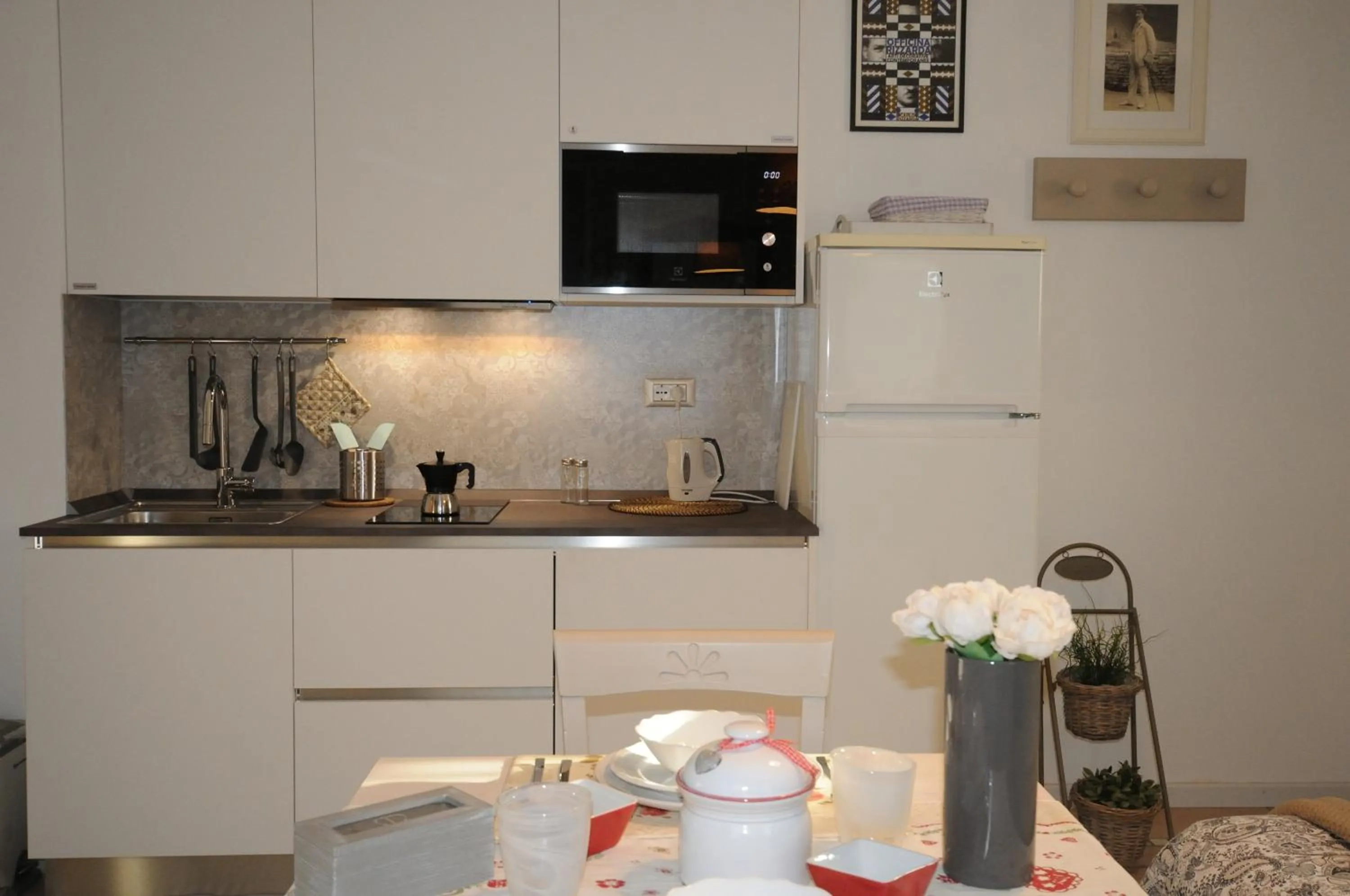 Kitchen or kitchenette in Casa Novecento "Rooms & apartments"