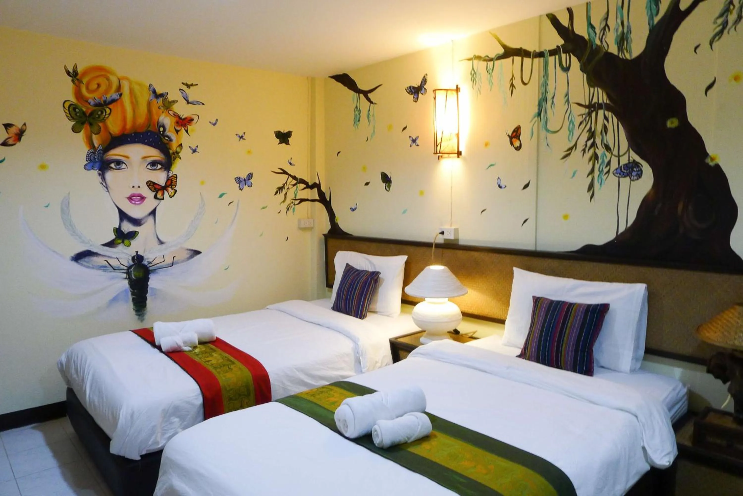 Bed in Dream Garden Villa Hotel Night Bazaar ChiangMai