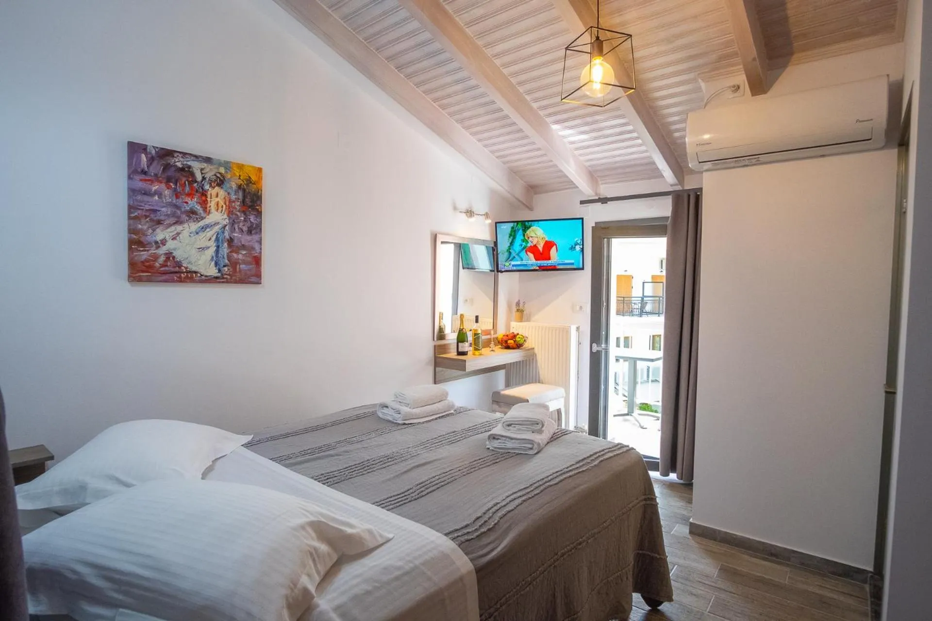 Bed in Serenity Luxe Suites