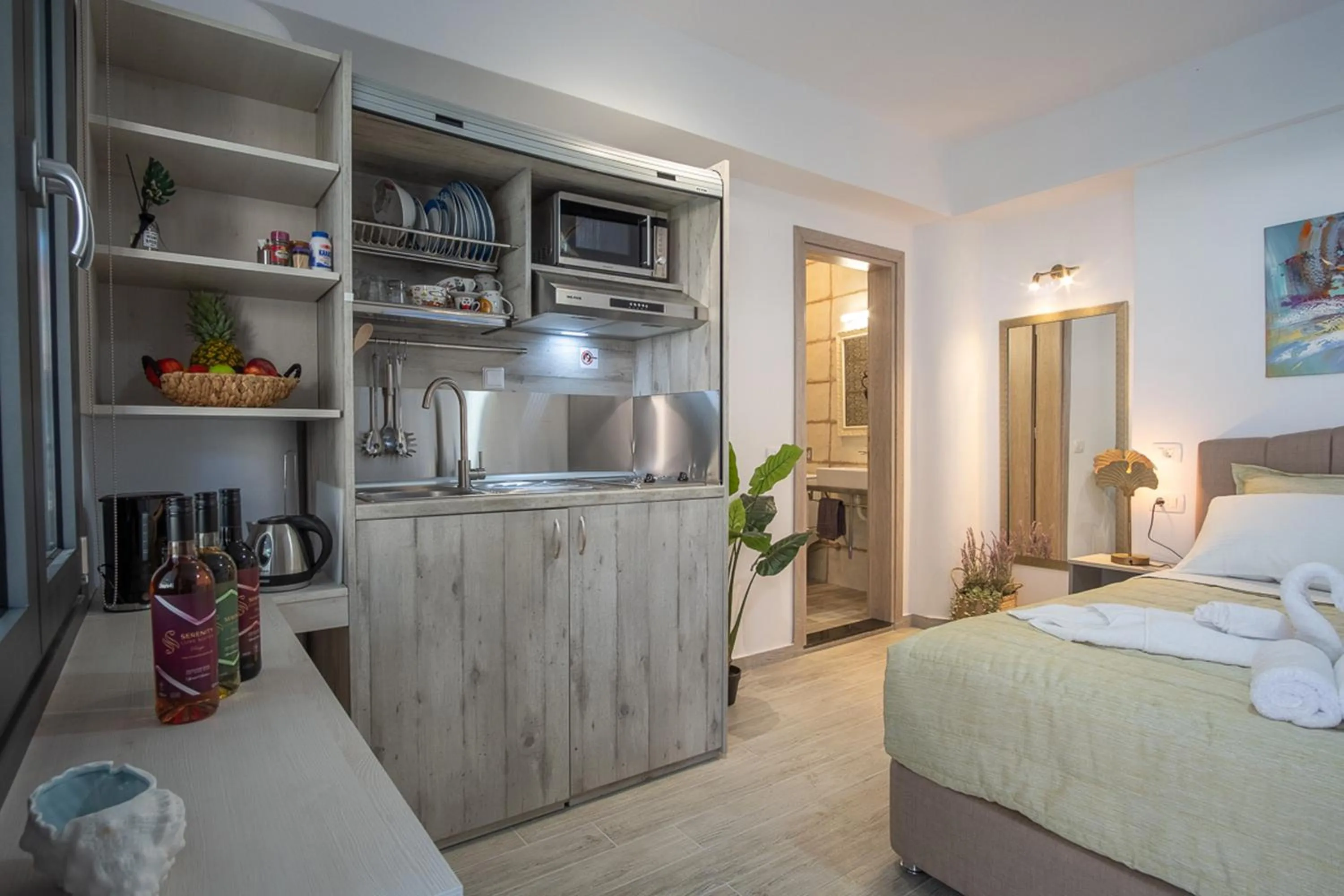 Kitchen or kitchenette, Bed in Serenity Luxe Suites