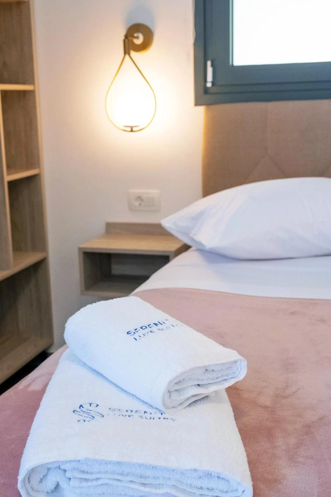 Bed in Serenity Luxe Suites