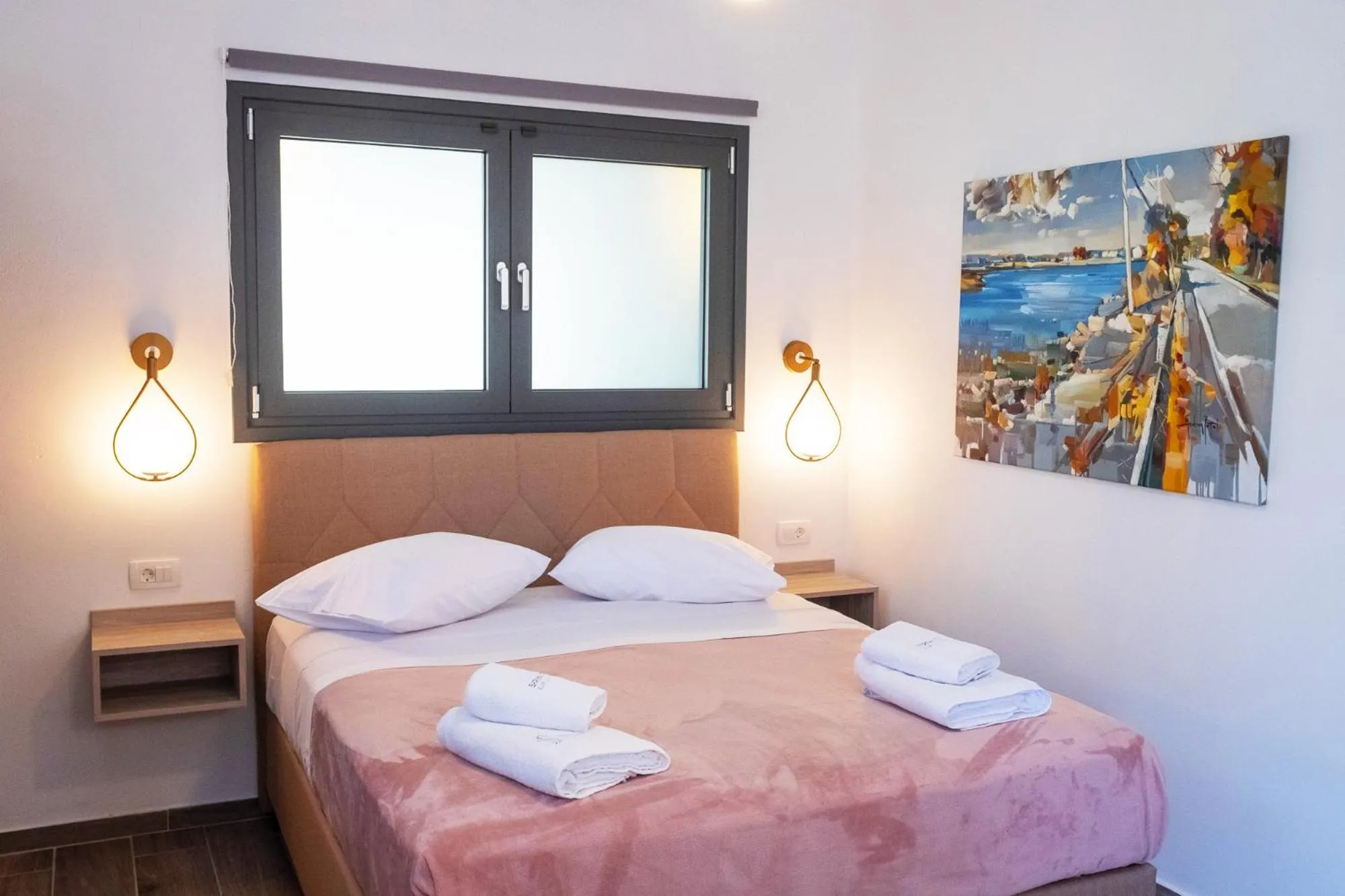 Bed in Serenity Luxe Suites