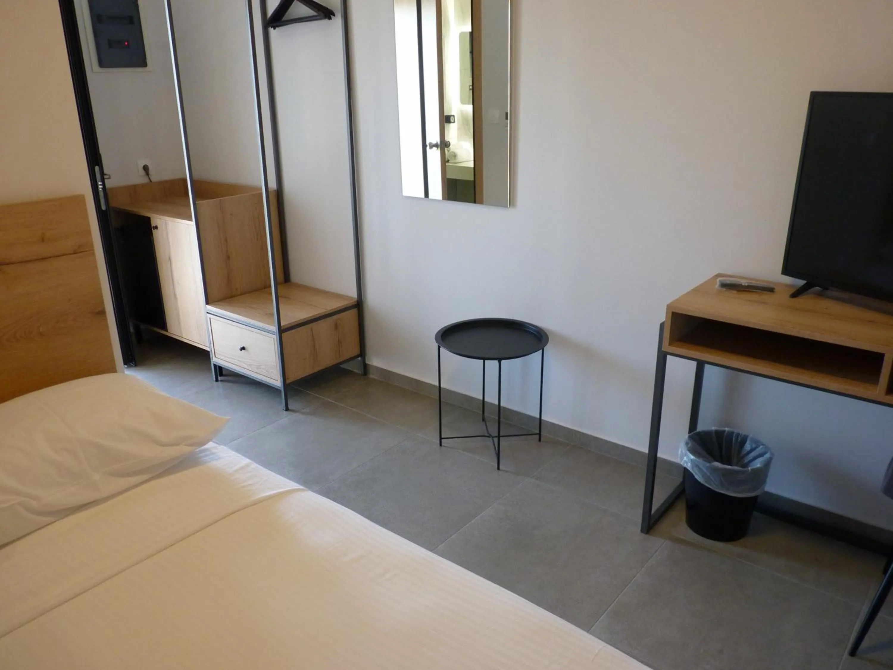 Bed in Comfort Suites & Rooms