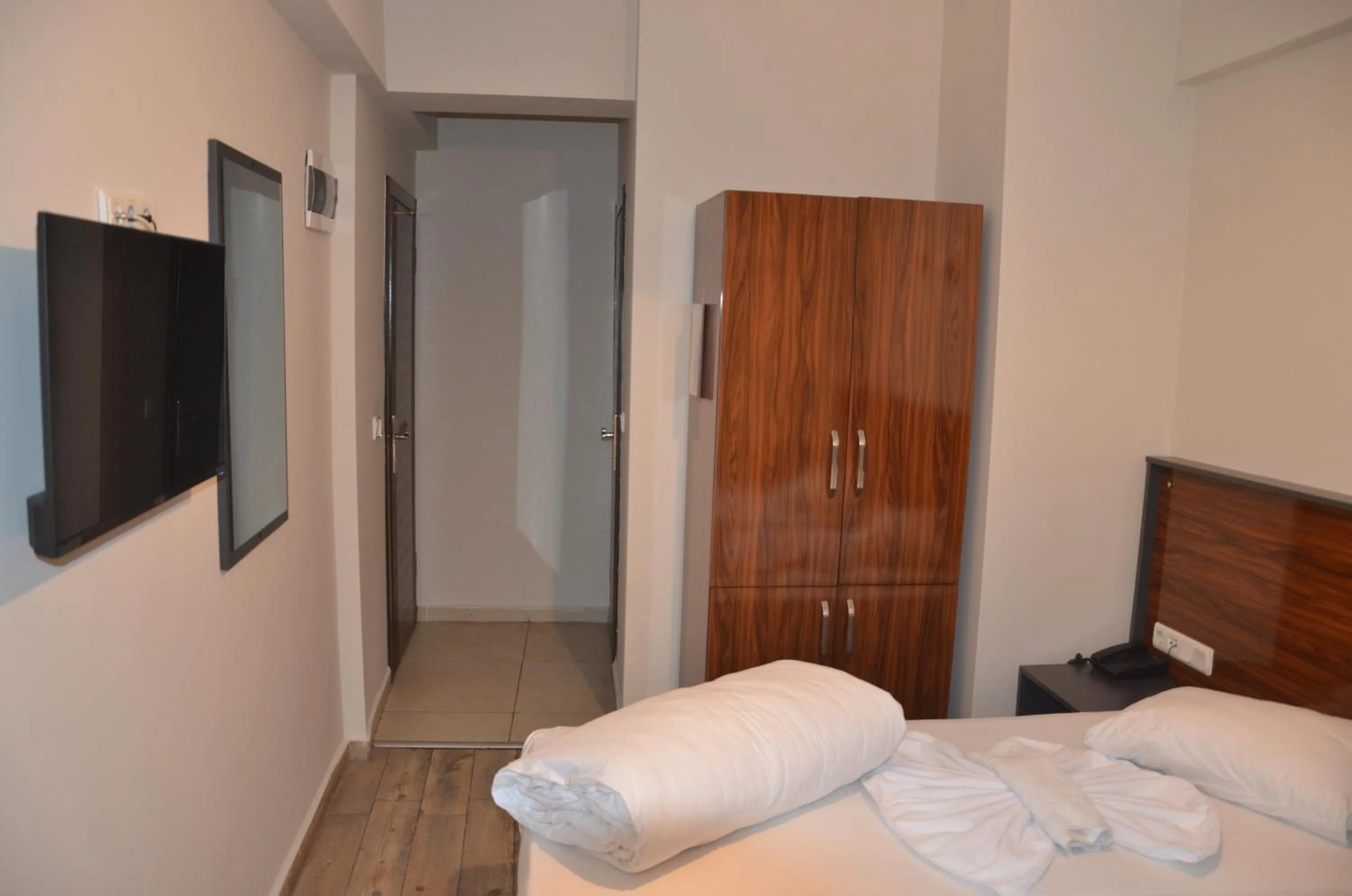 wardrobe, Bed in Marka Hotel