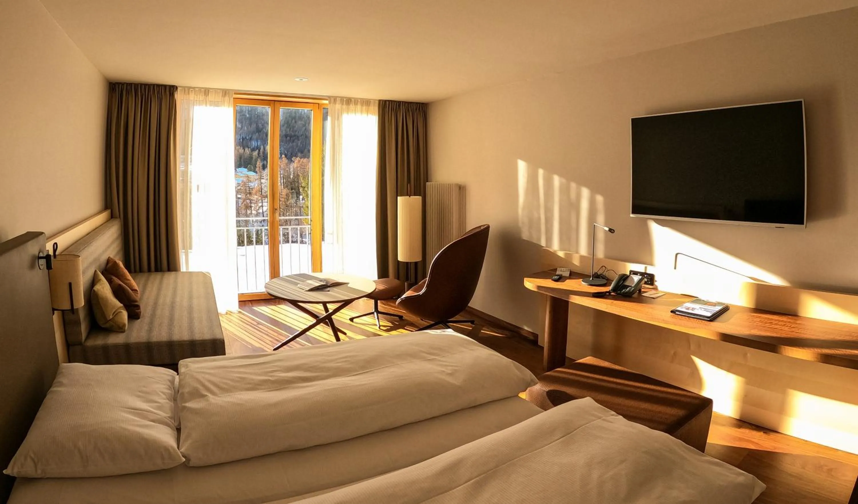 Photo of the whole room, Bed in Hotel Saratz Pontresina Mountain Resort & Spa