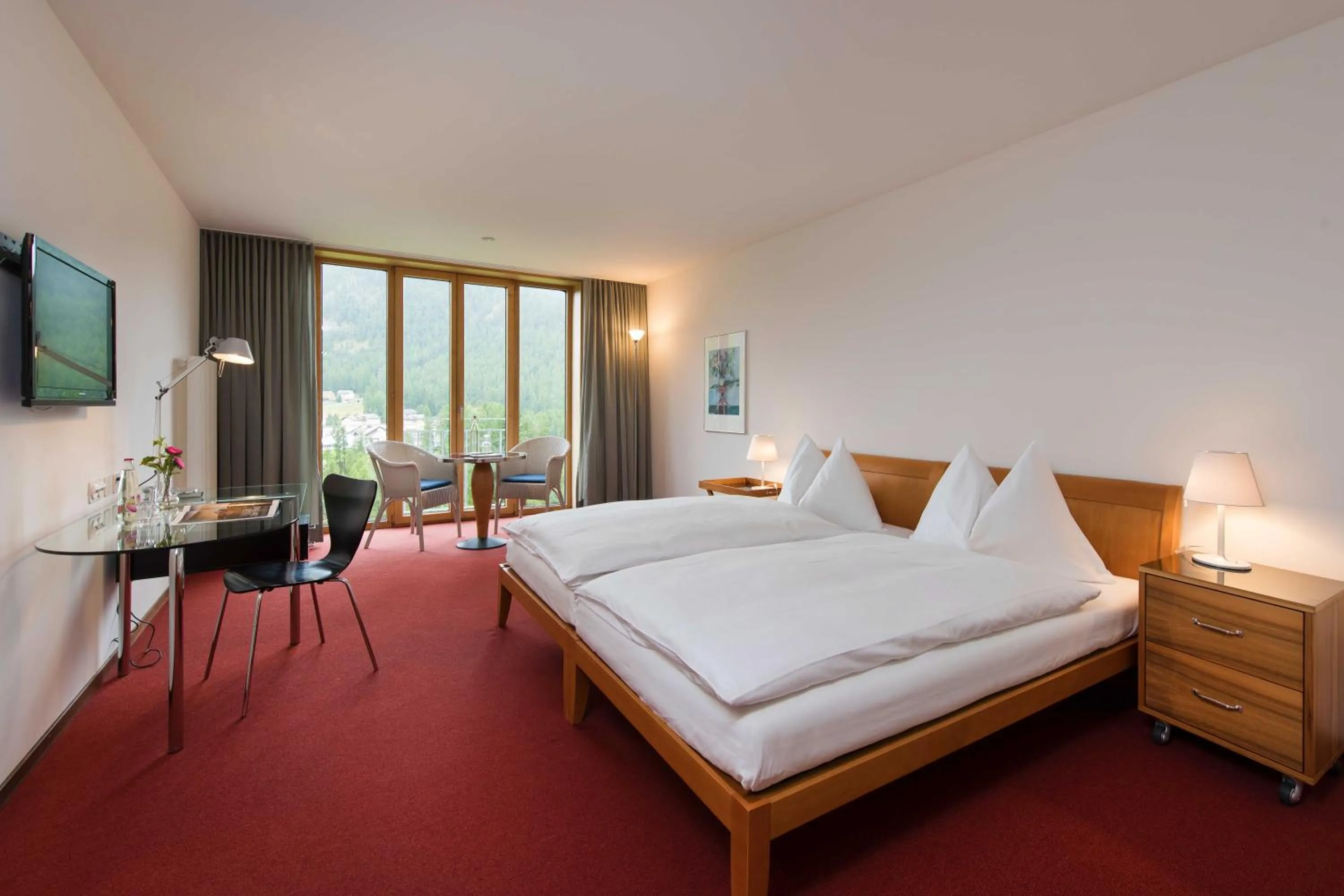 Photo of the whole room, Bed in Hotel Saratz Pontresina Mountain Resort & Spa