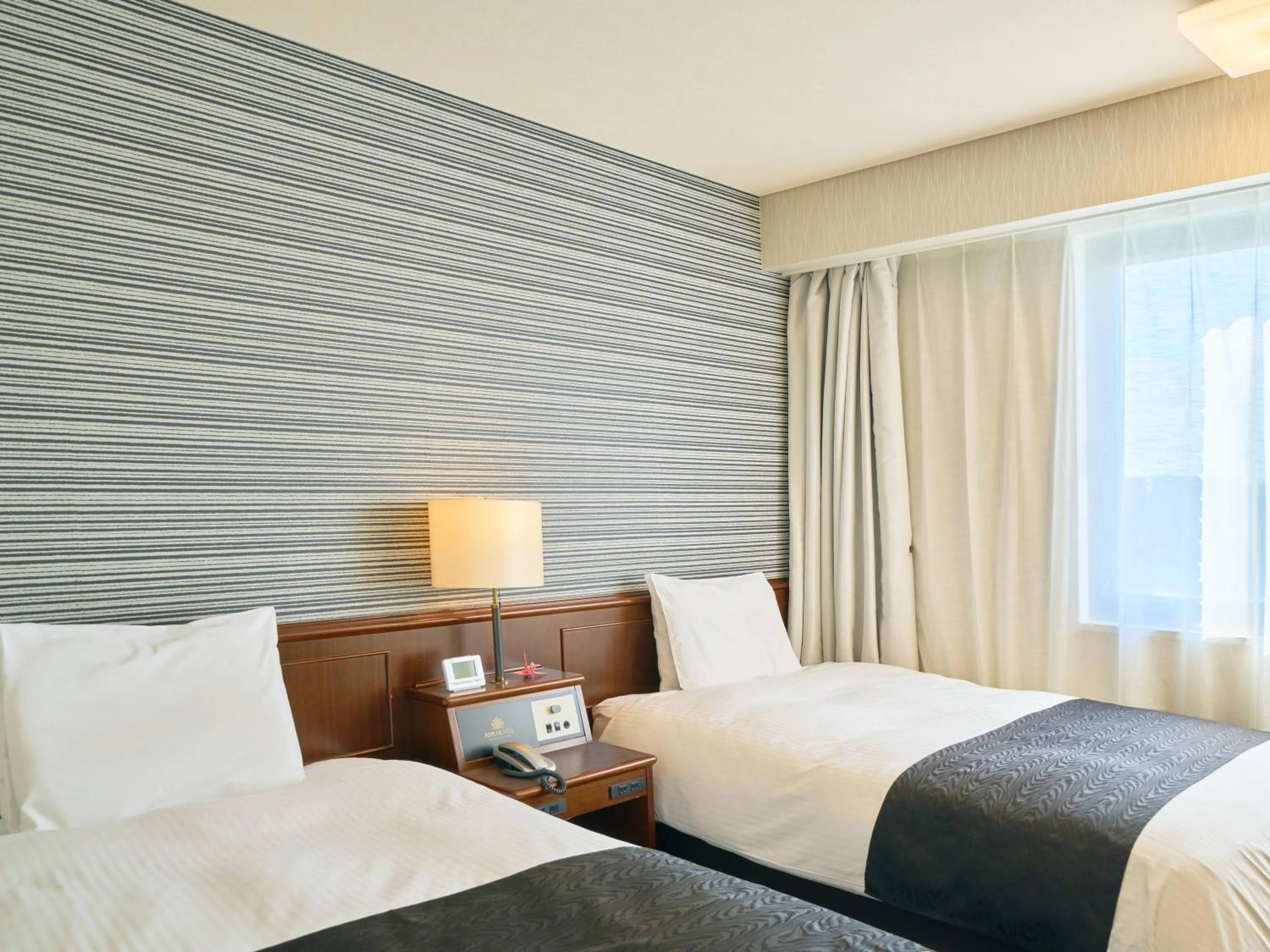 Bed in APA Hotel Matsuyamajo Nishi