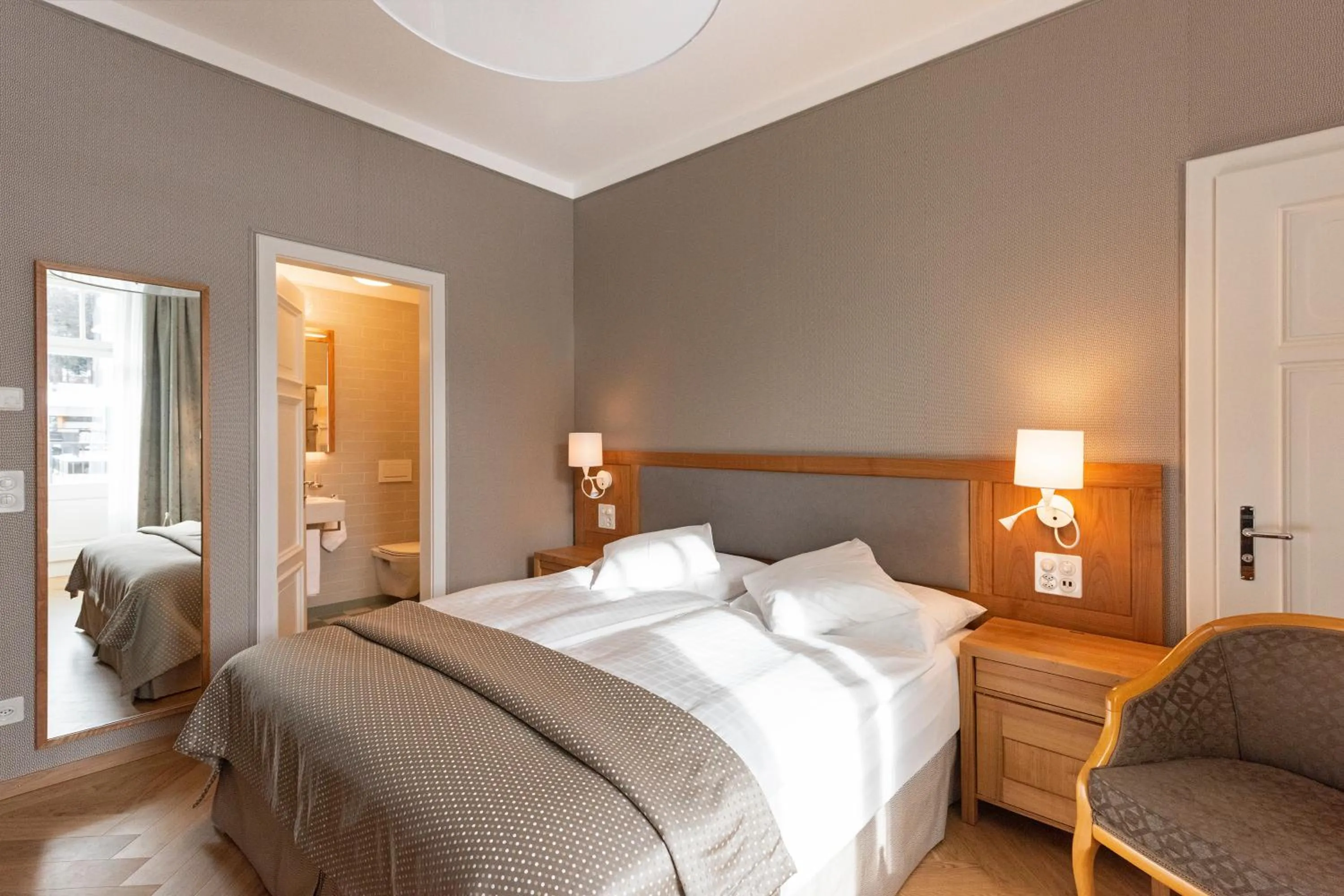 Photo of the whole room, Bed in Hotel Waldhaus Sils