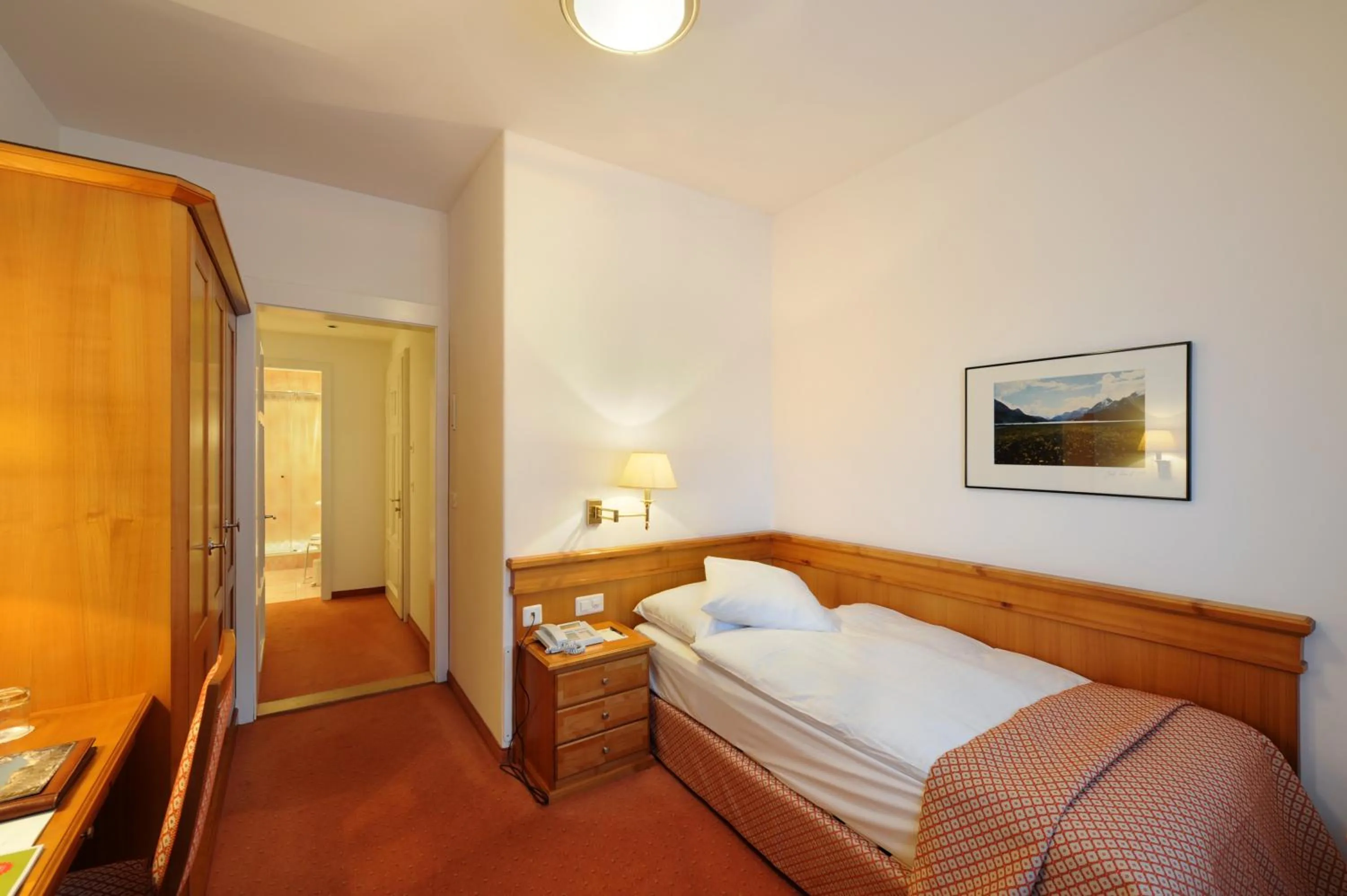 Photo of the whole room, Bed in Hotel Waldhaus Sils