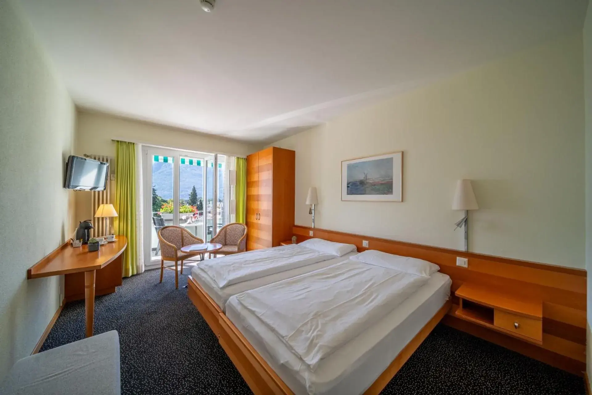 Superior Panorama Double Room with Balcony Lake view in Hotel La Perla Superior Panorama Double Room with Balcony Lake view in Hotel La Perla