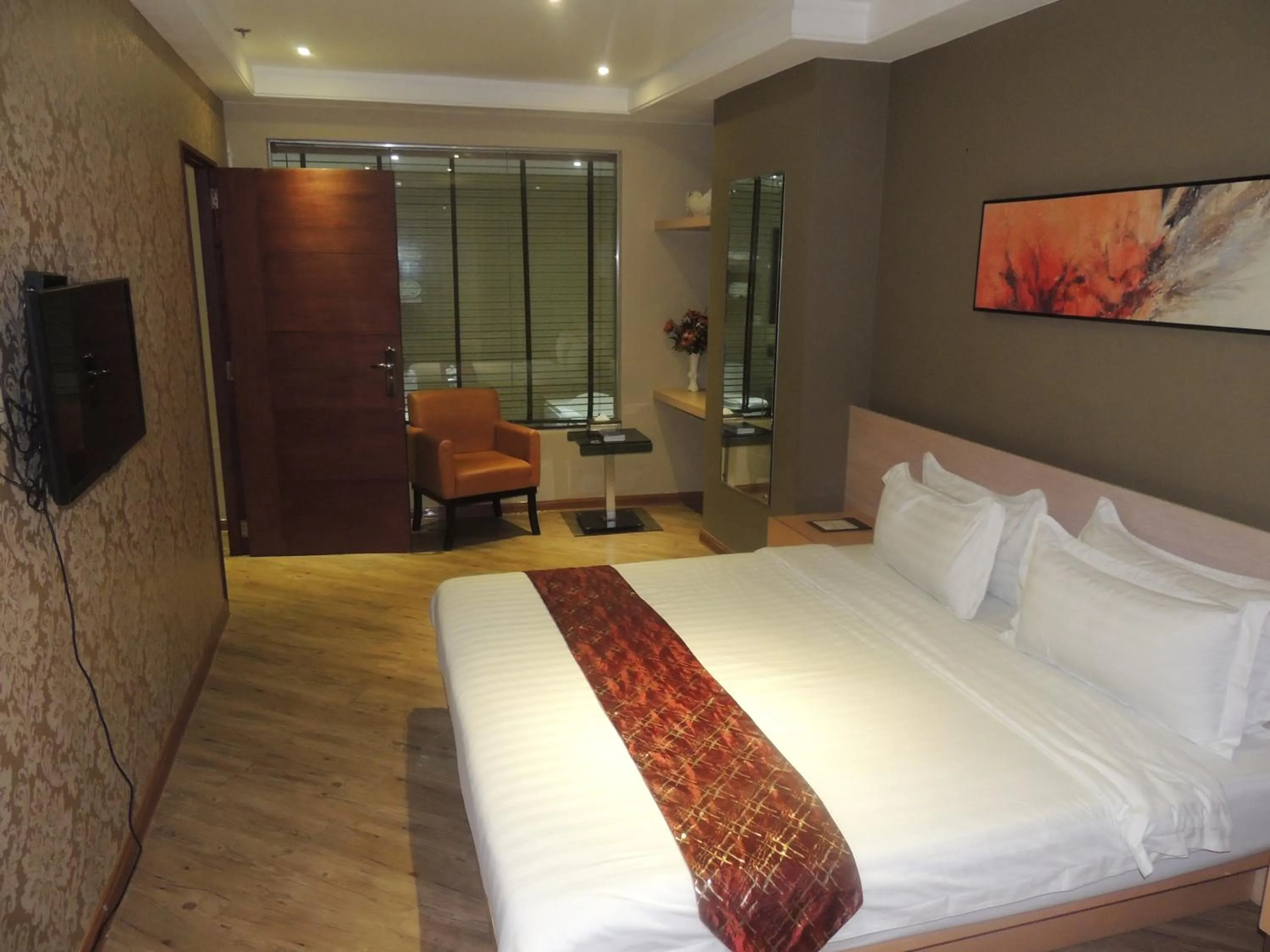 Bed in Dela Chambre Hotel