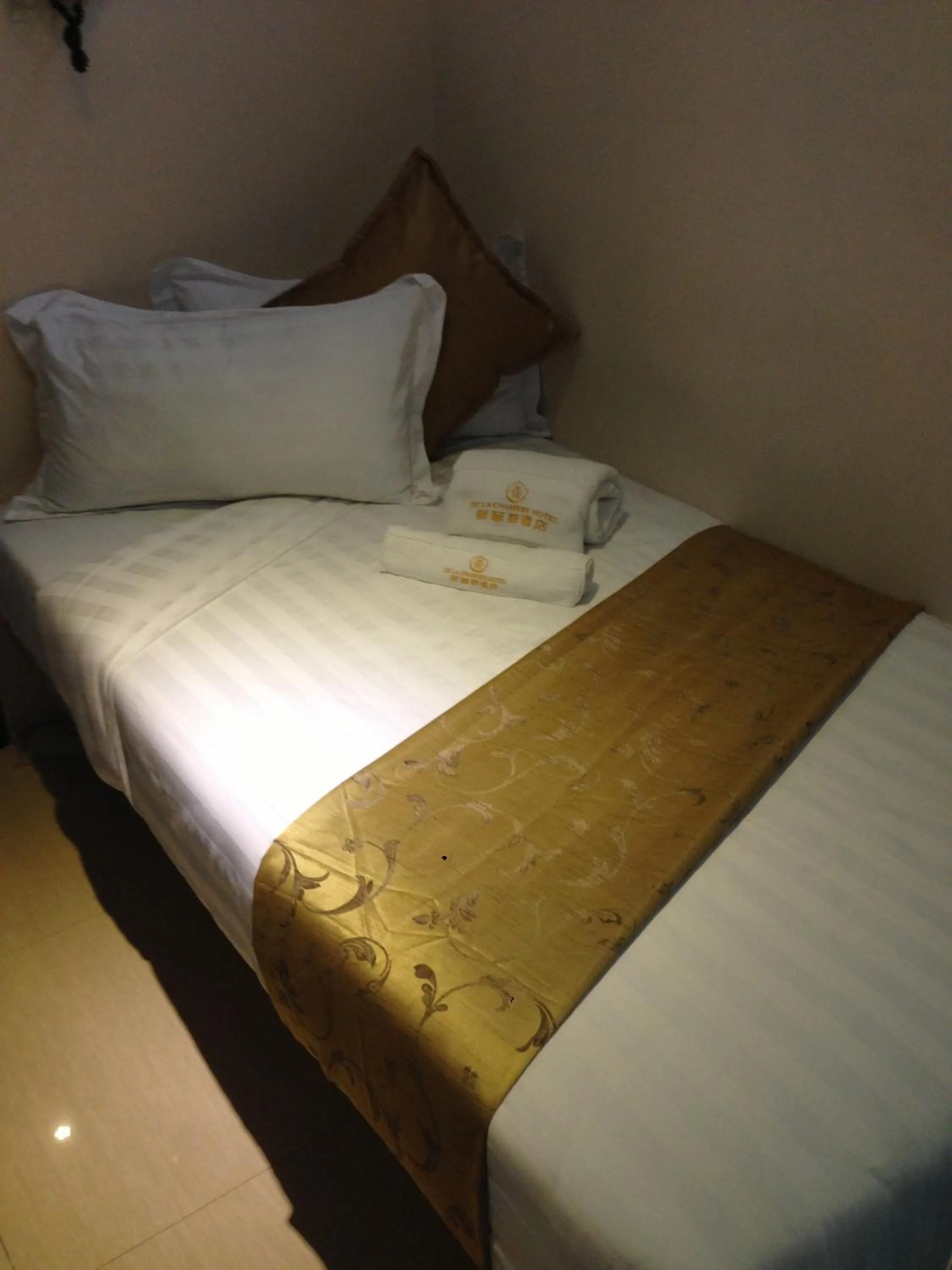 Bed in Dela Chambre Hotel