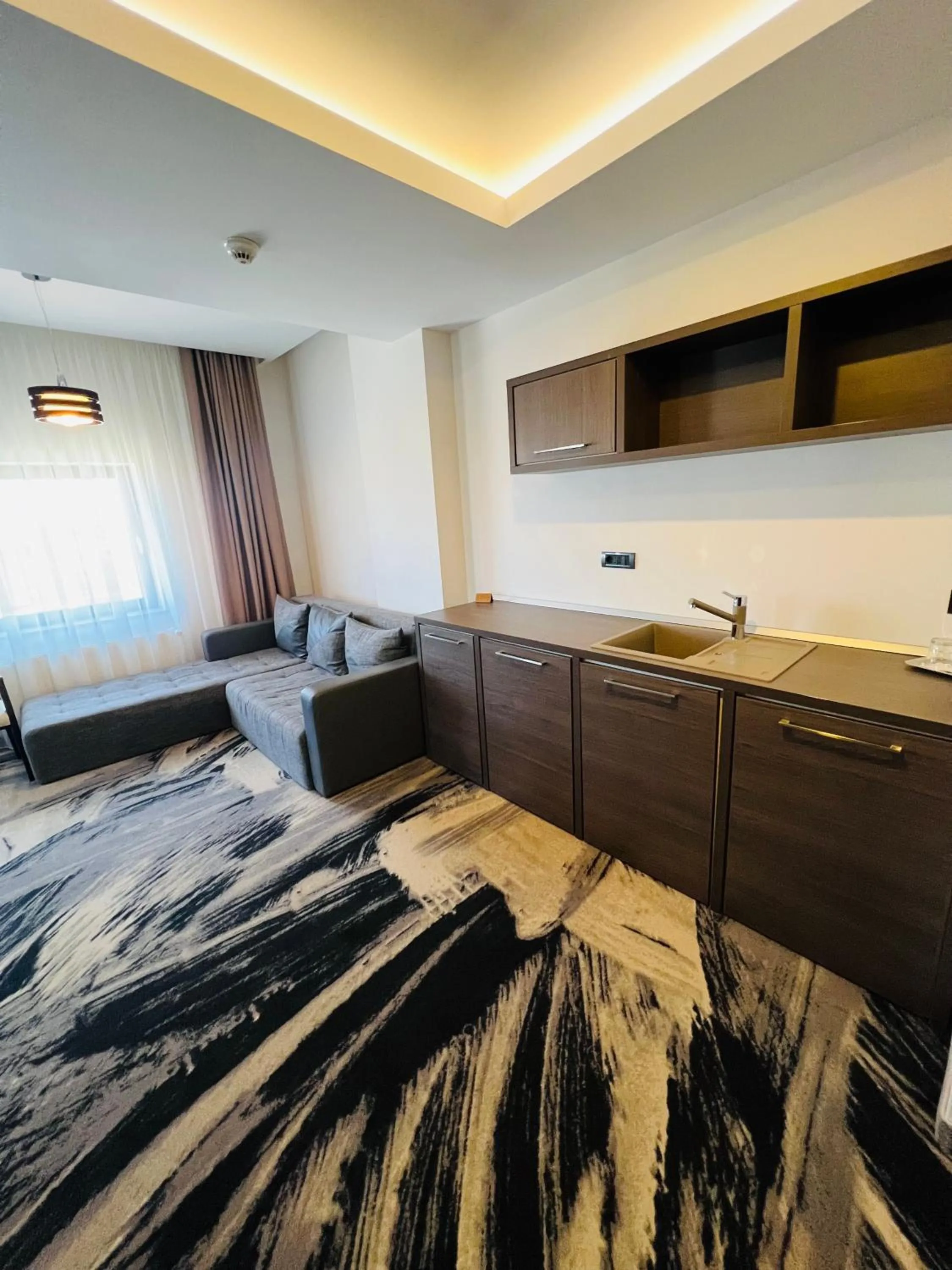 Living room, Bed in Hotel Scapino